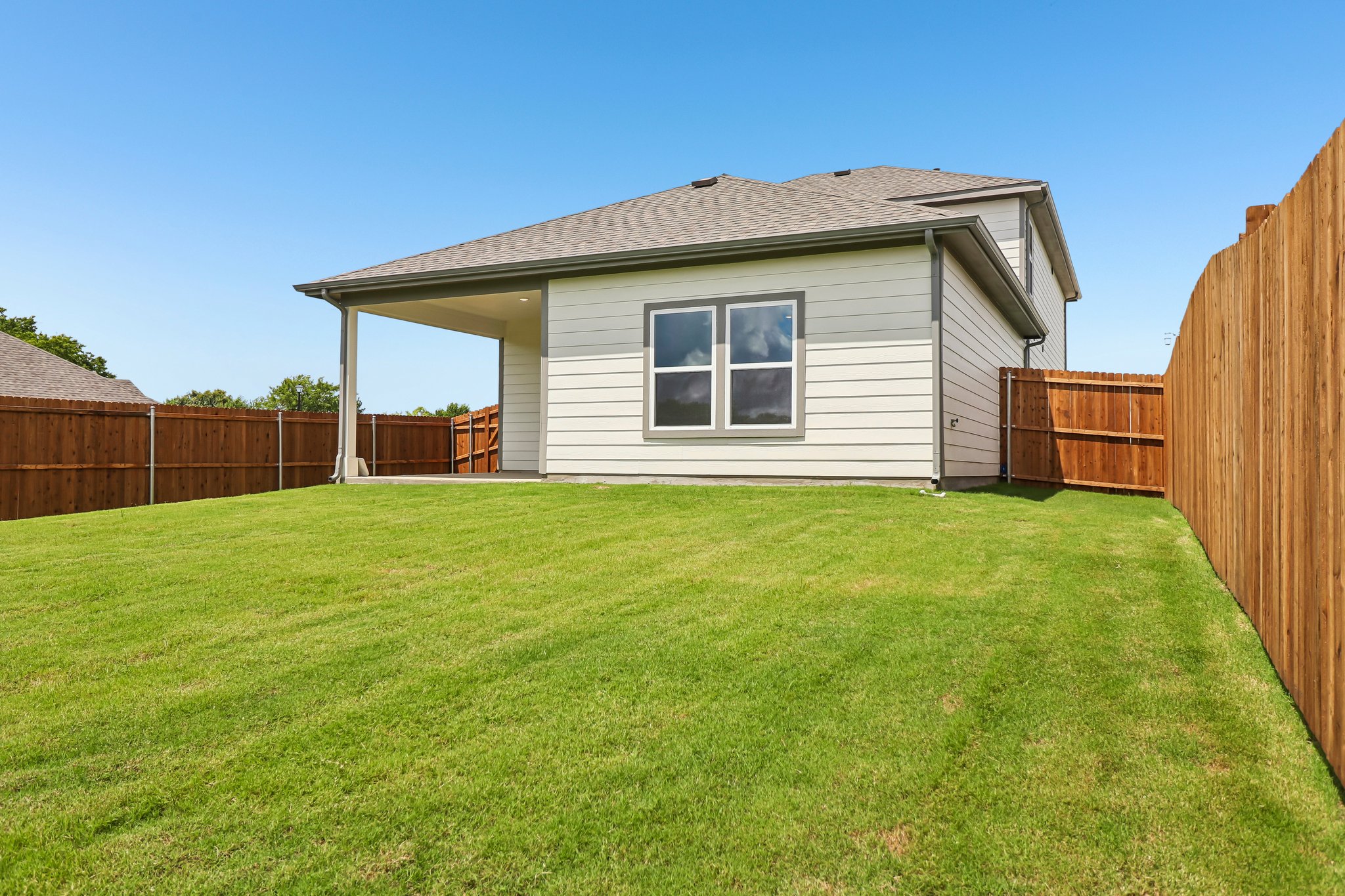 A house with a fence around it.