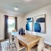 Dining space at 204 Sun Harvest Drive at Ambergrove by Century Communities