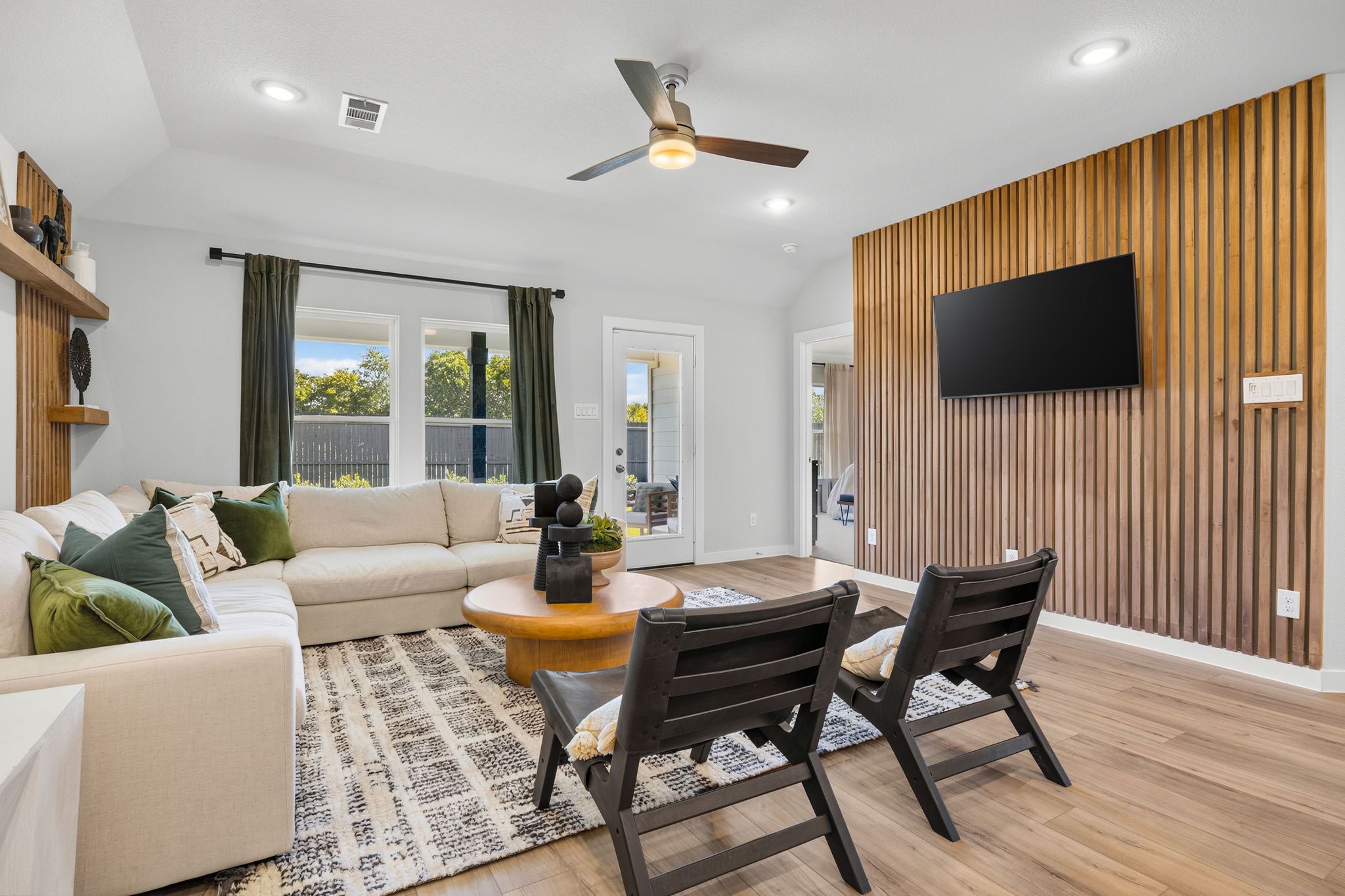 A living room with a large window.