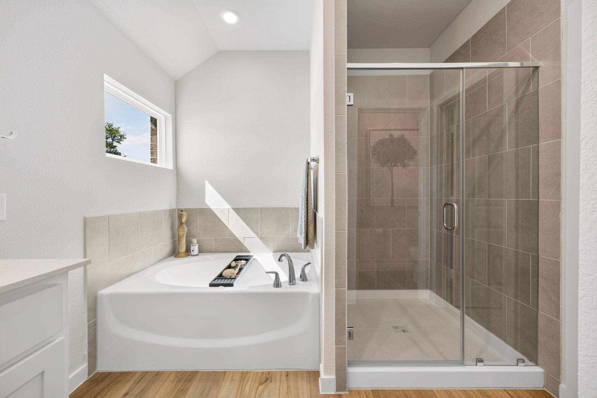 A bathroom with a glass shower.