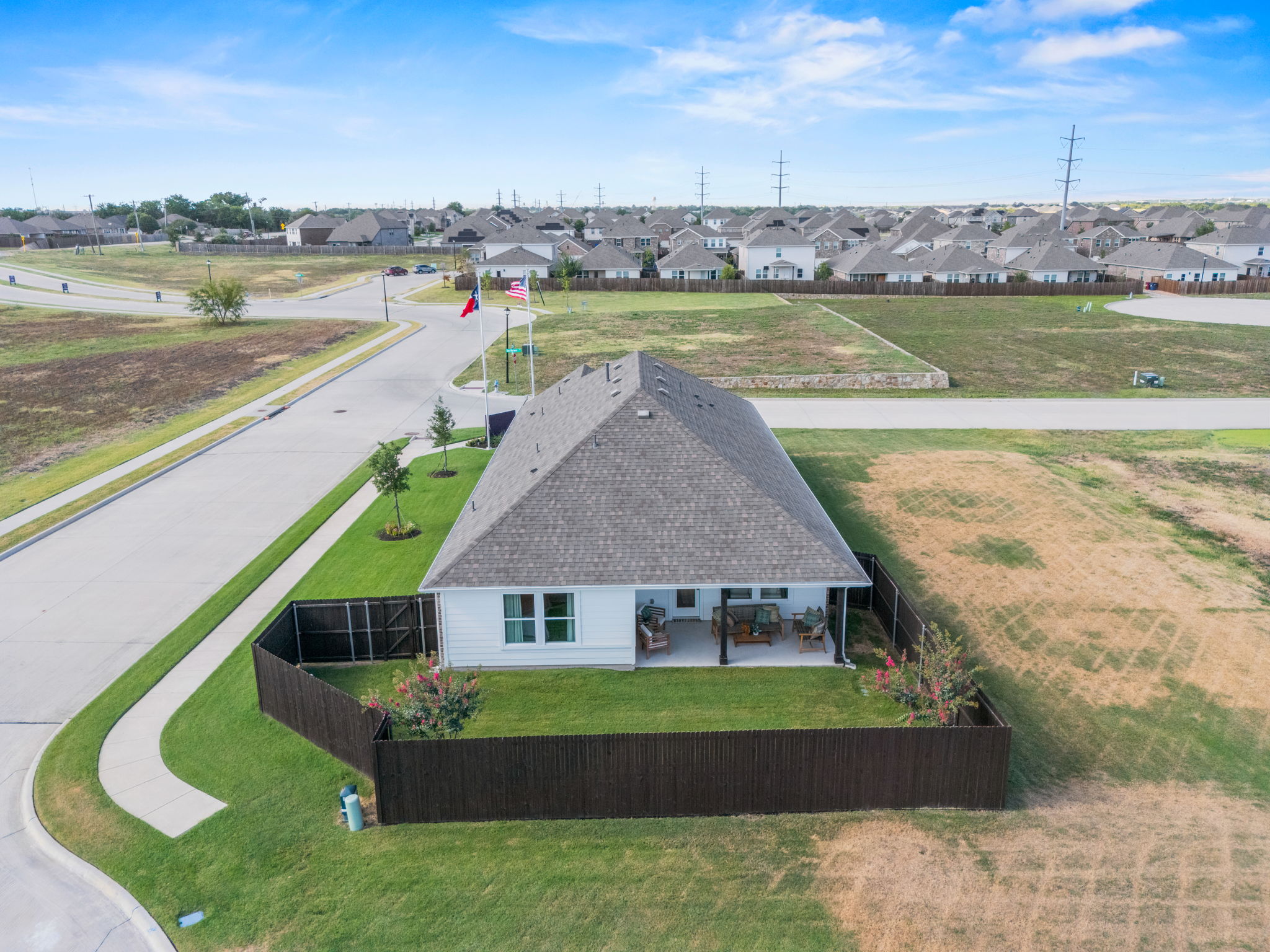 A house with a grass yard.