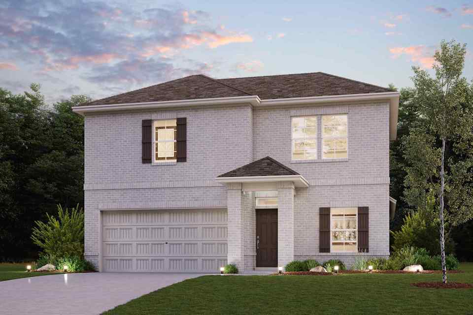 A house with a lawn and trees.