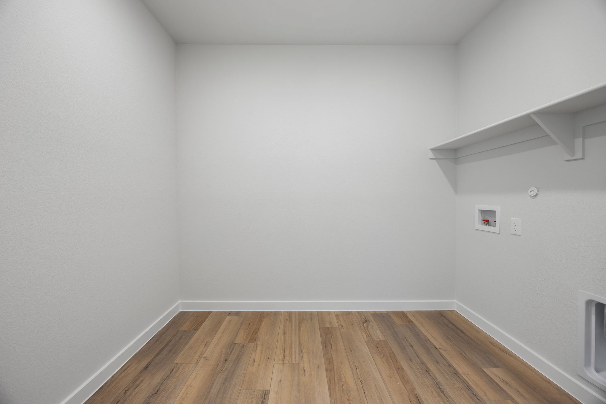 A room with white walls.