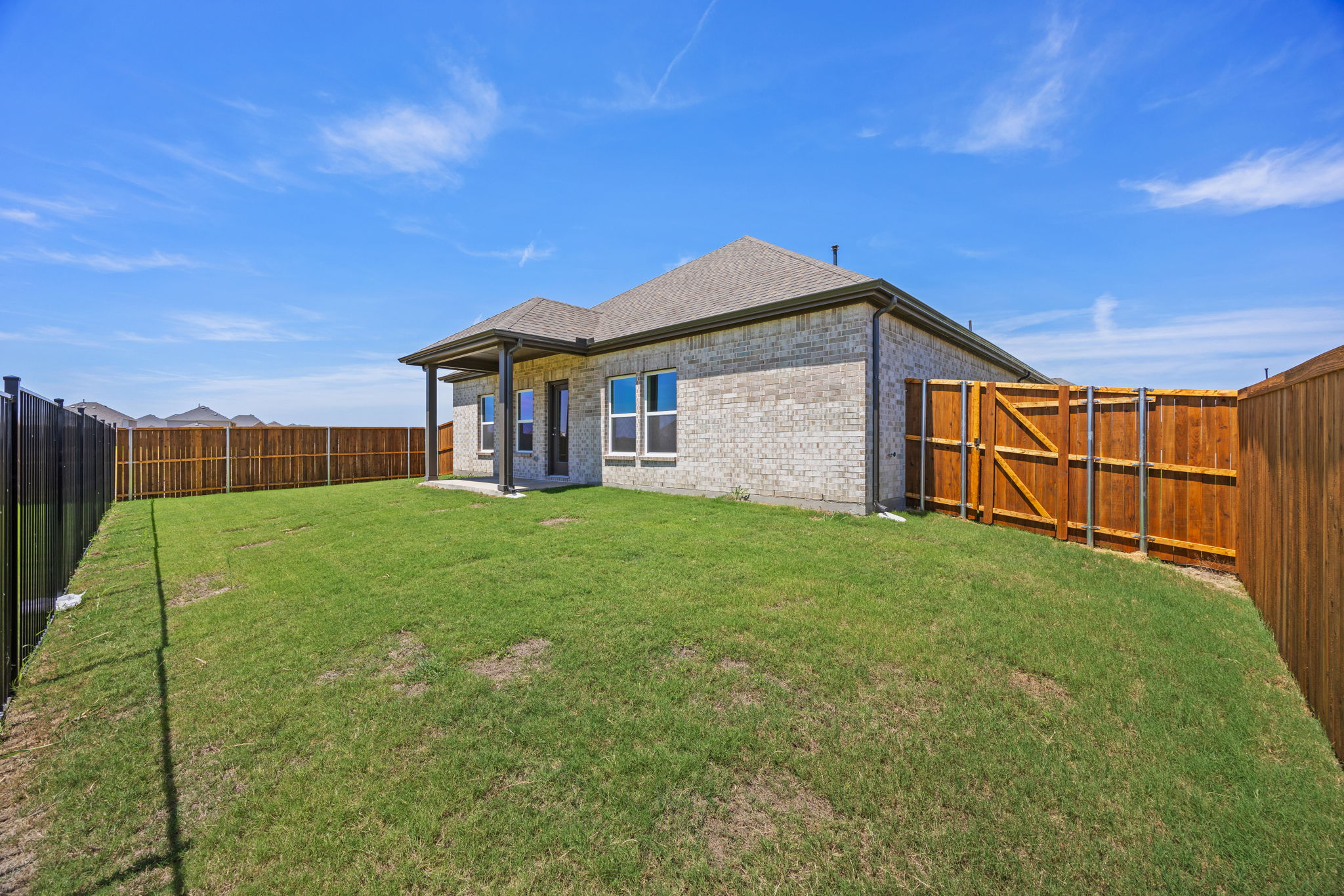 A house with a fence around it.