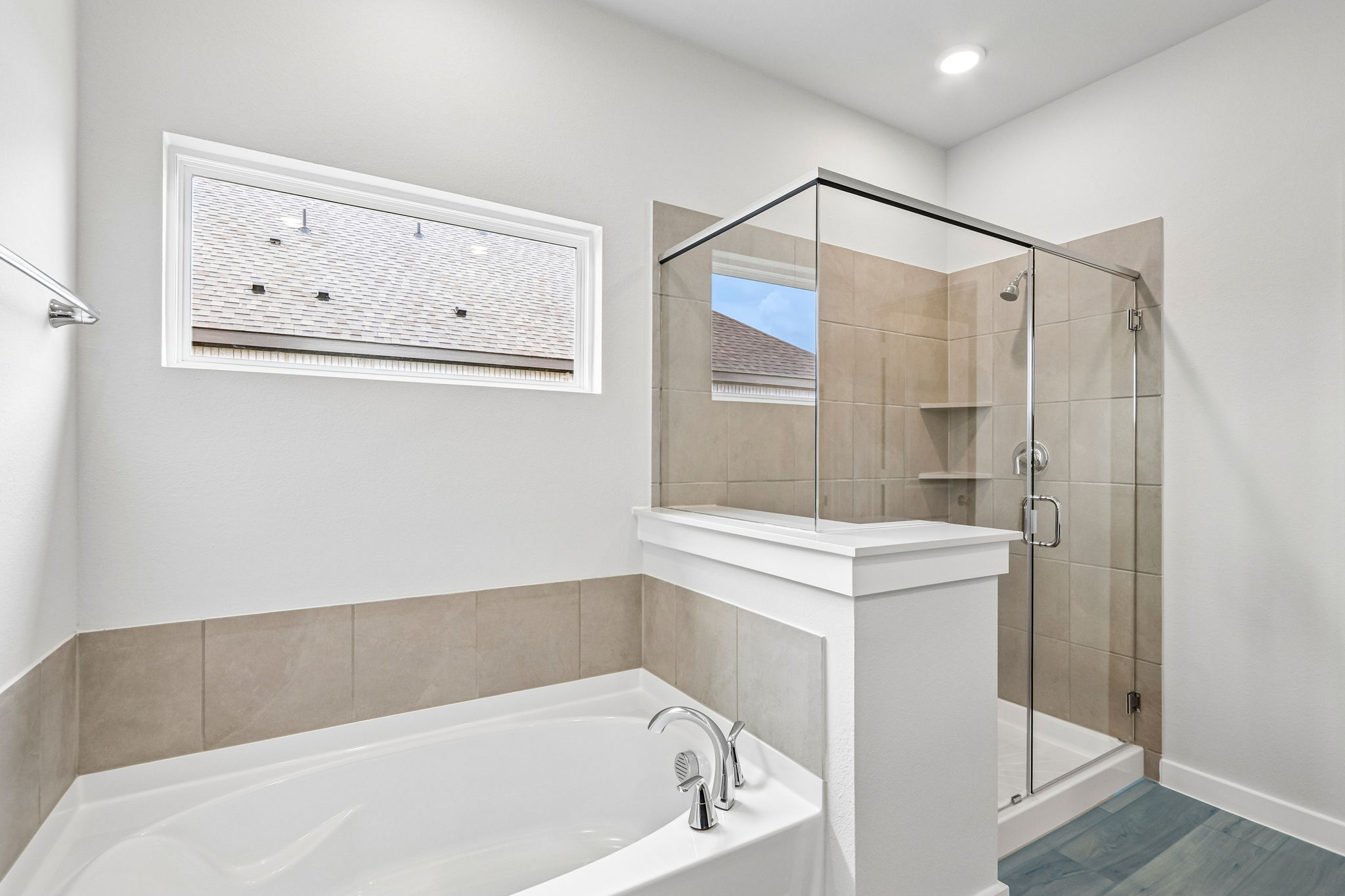 A bathroom with a glass shower.