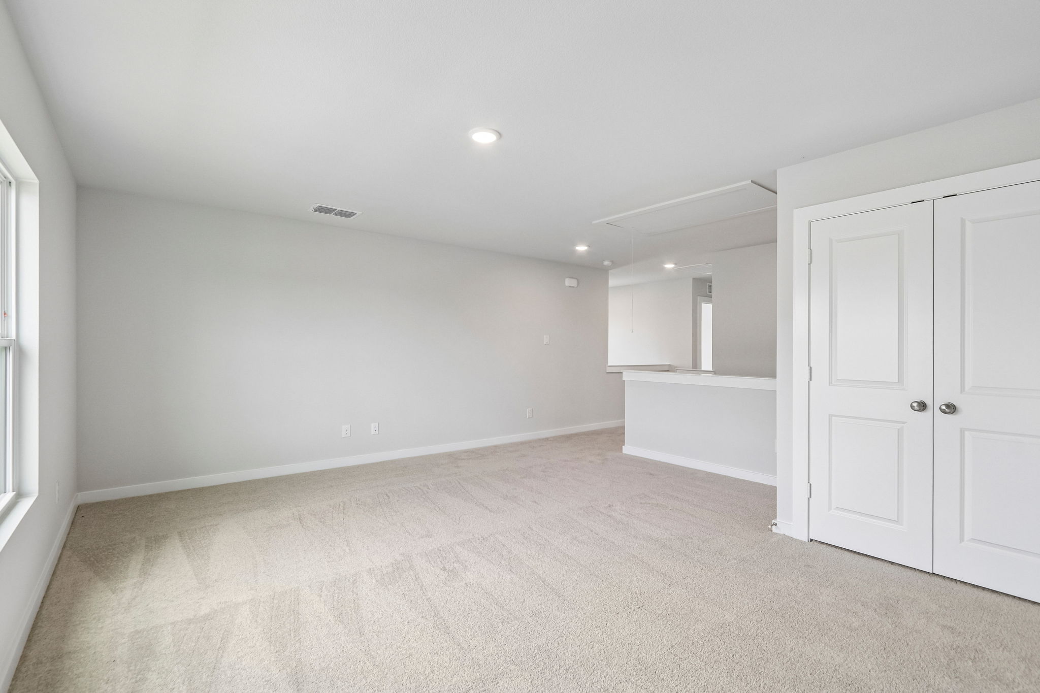 A room with white doors.