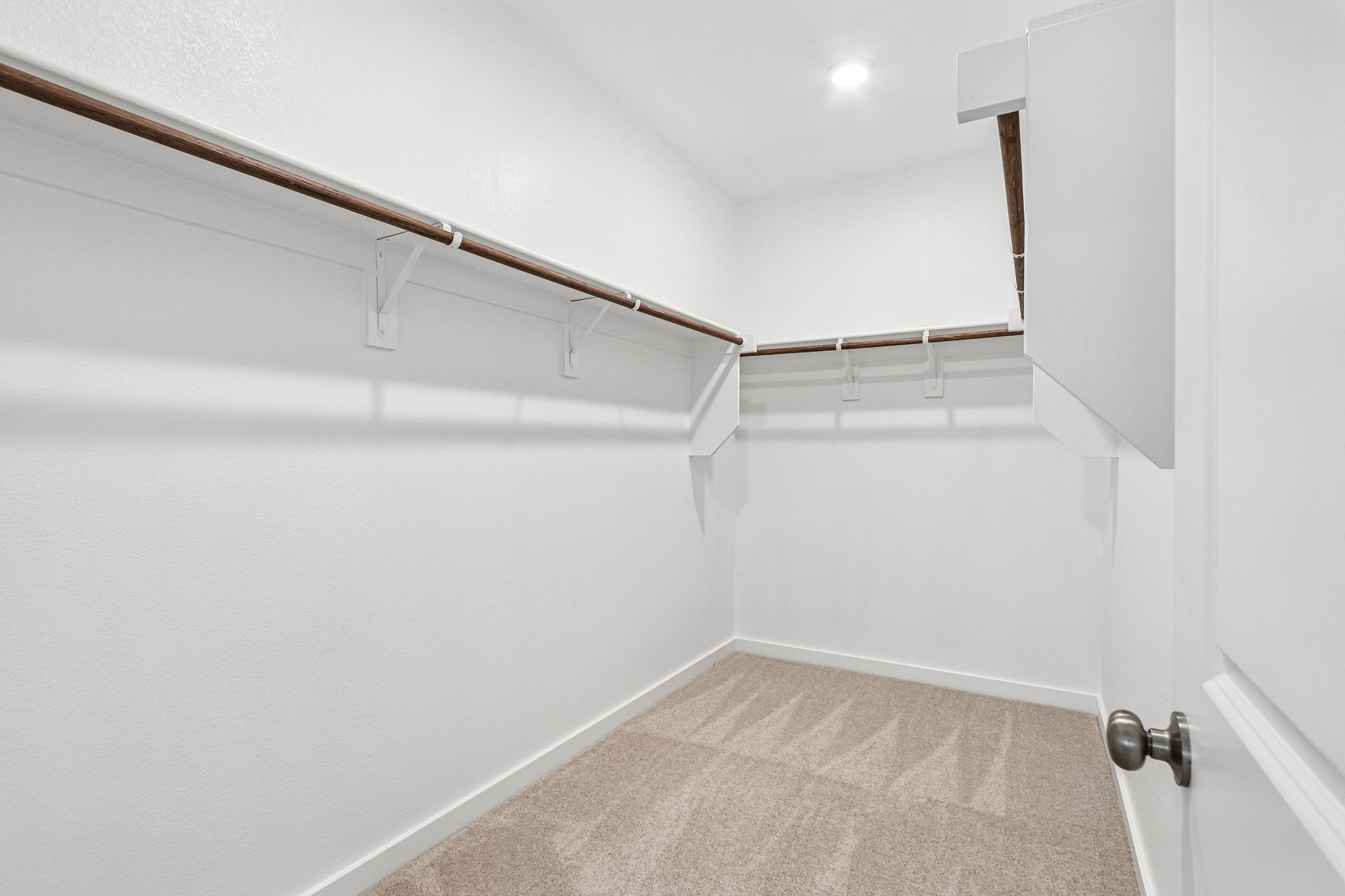 A white room with a white wall.