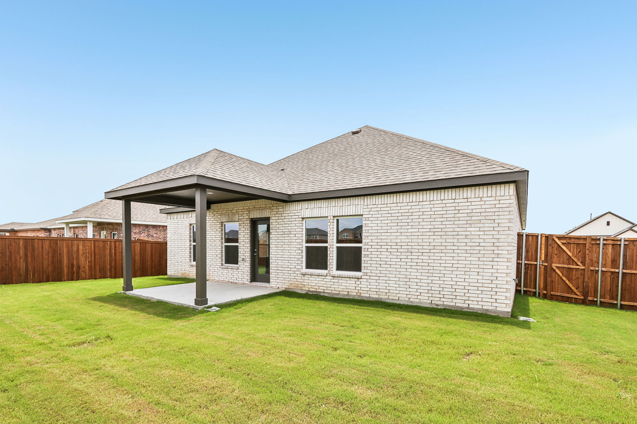 A house with a fence around it.