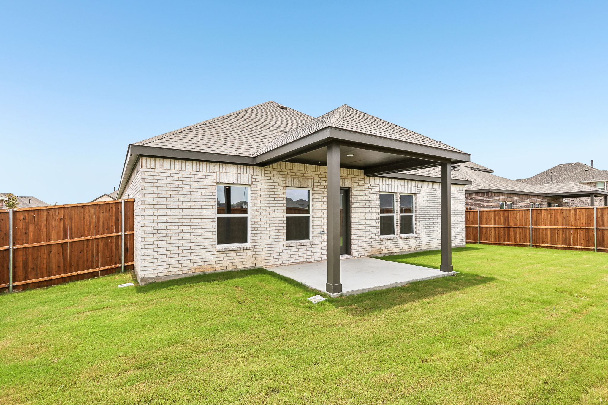 A house with a fence around it.