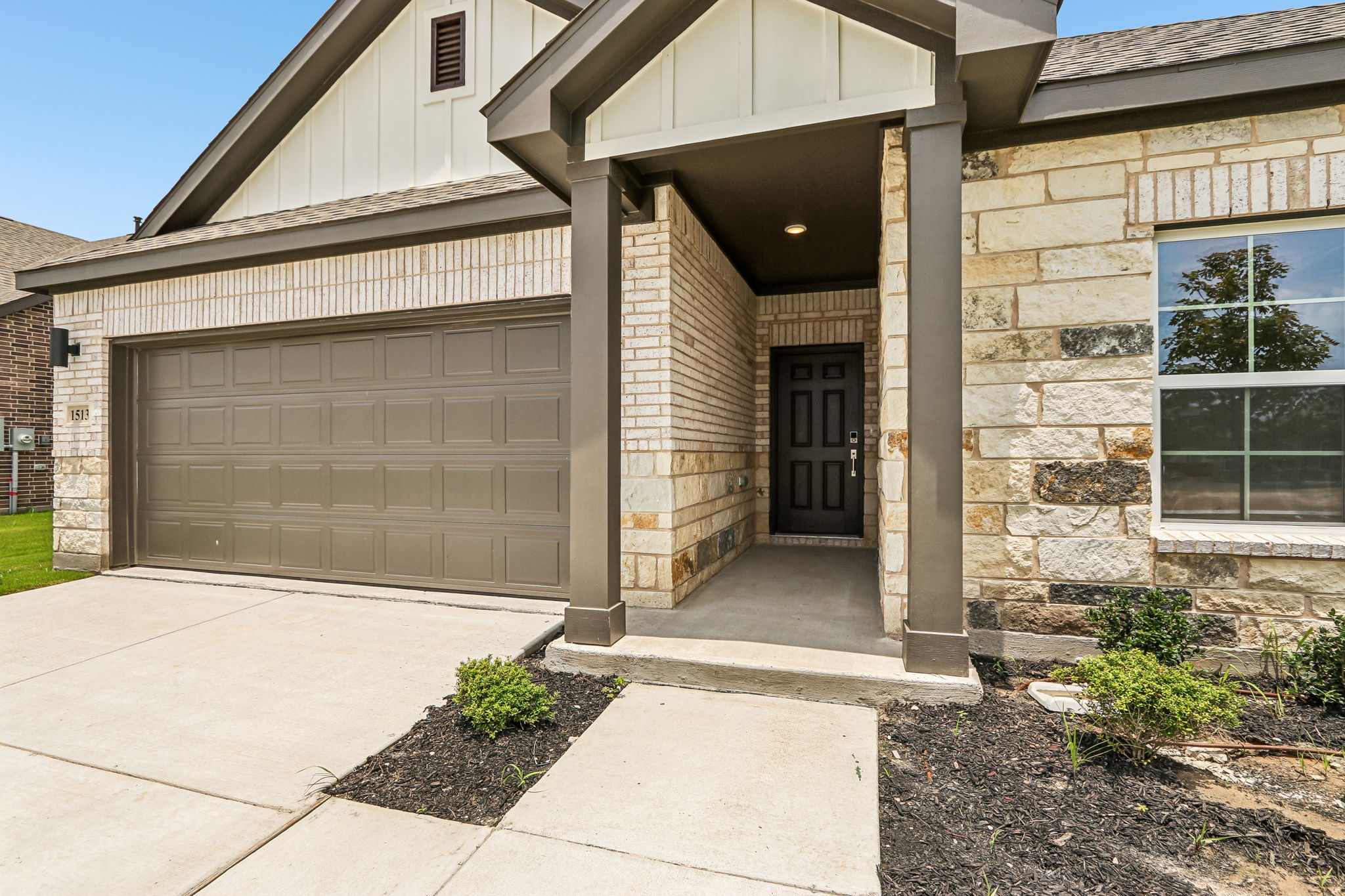 A garage door and garage.