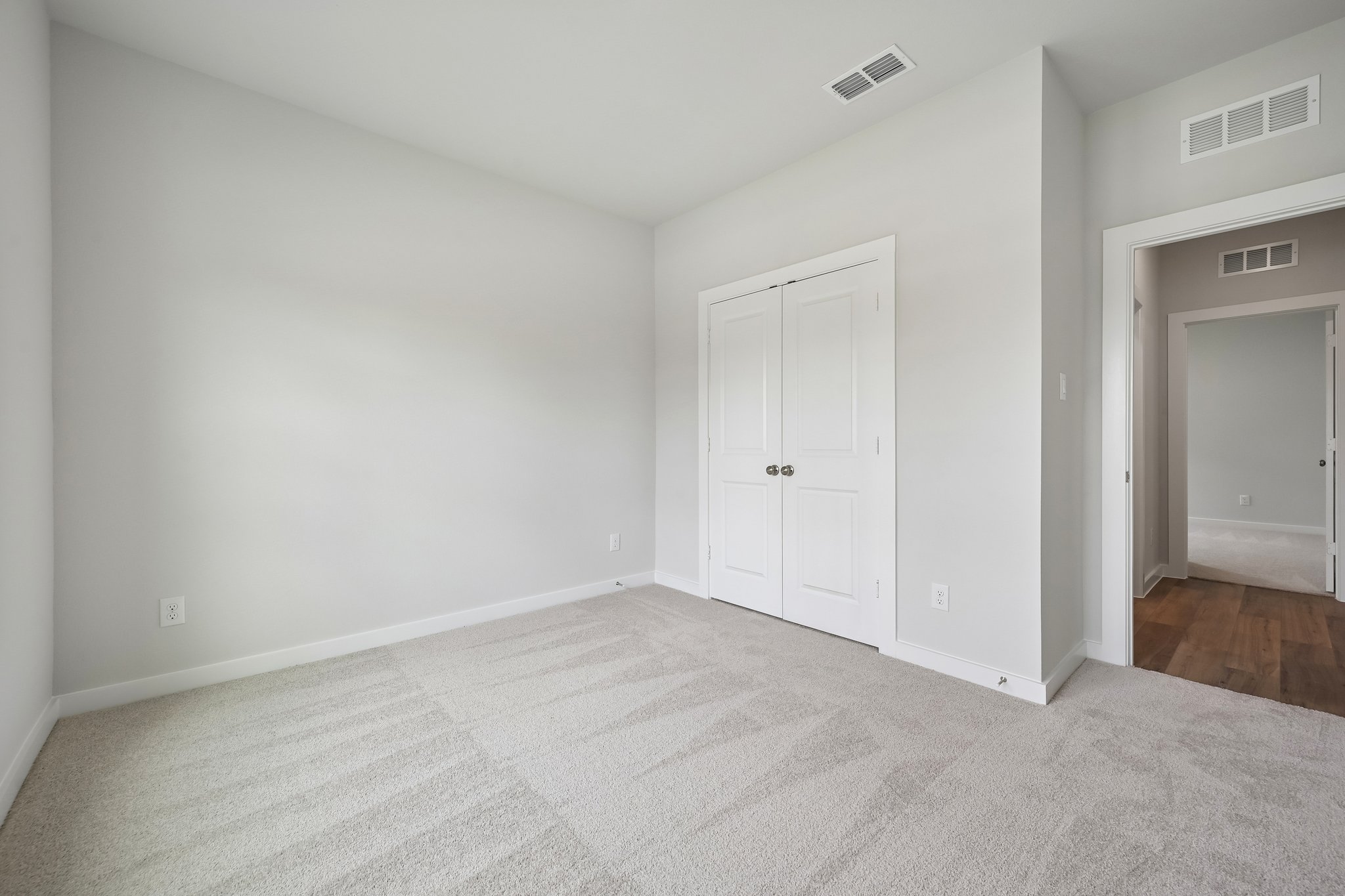 A room with white doors.