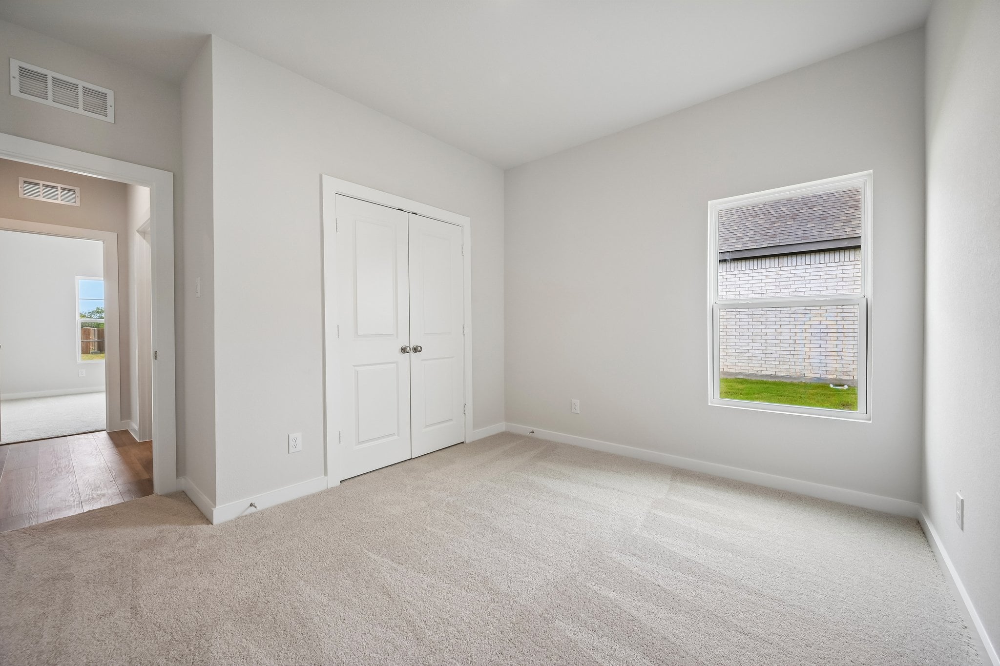 A room with white doors.