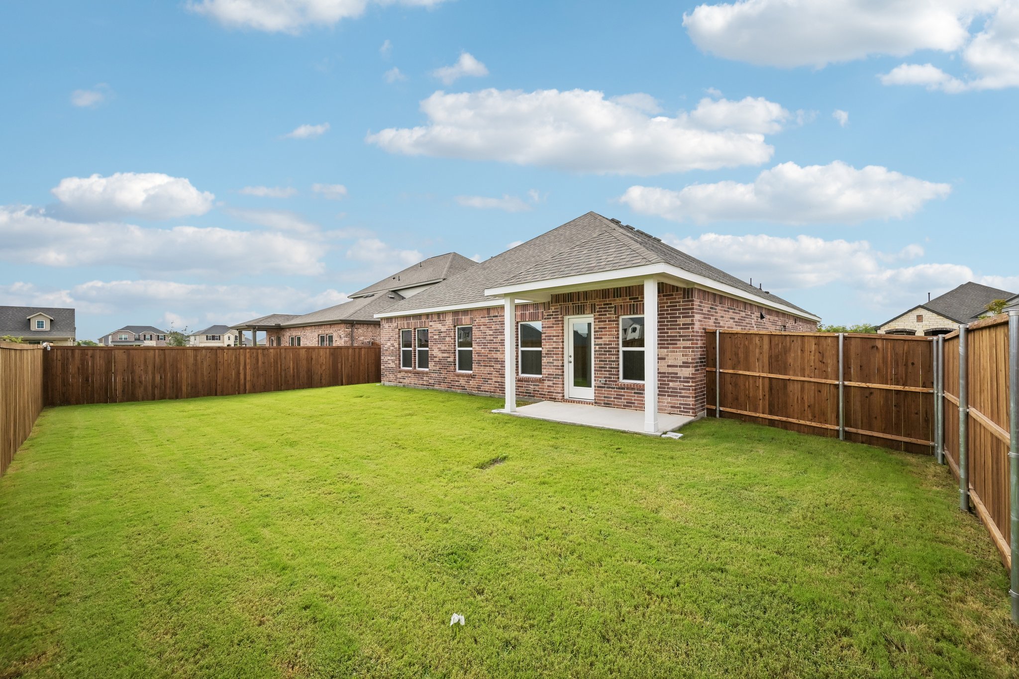 A house with a fence around it.