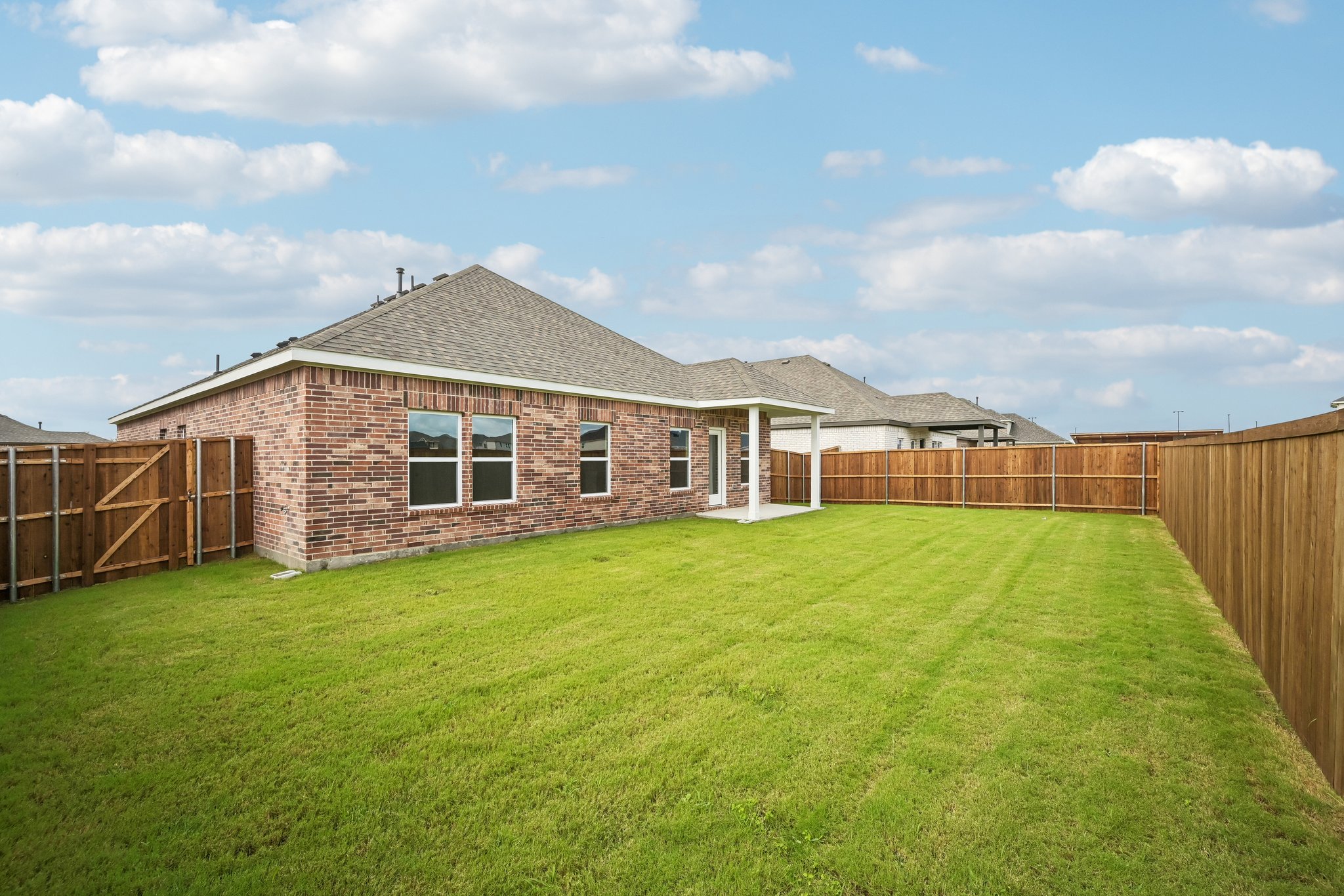 A house with a fence around it.