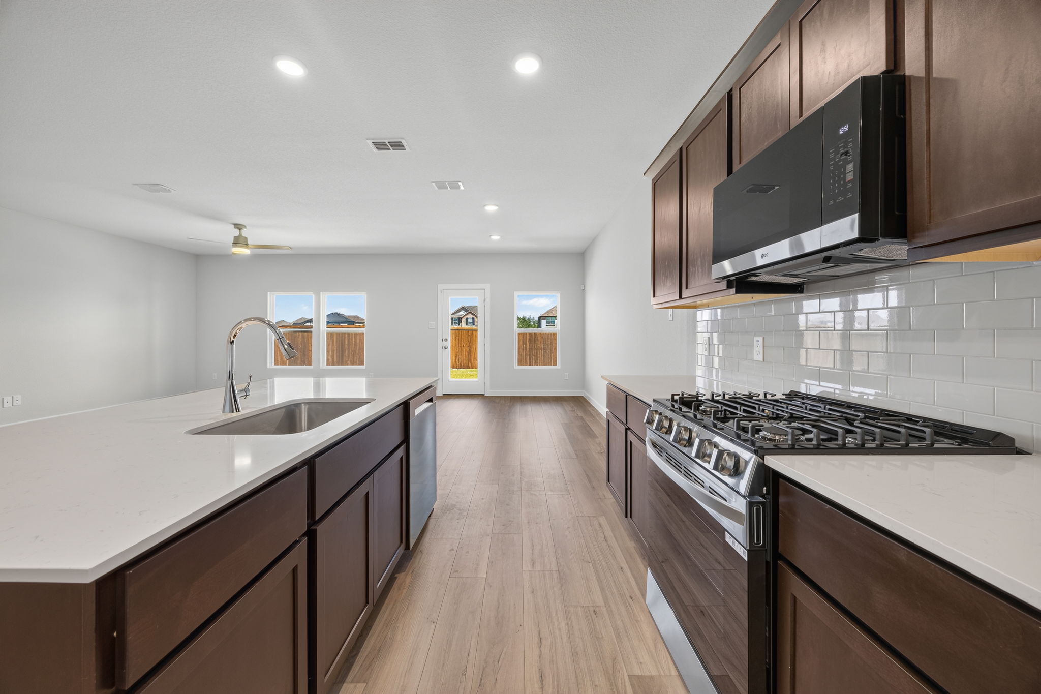 A kitchen with a stove and oven.
