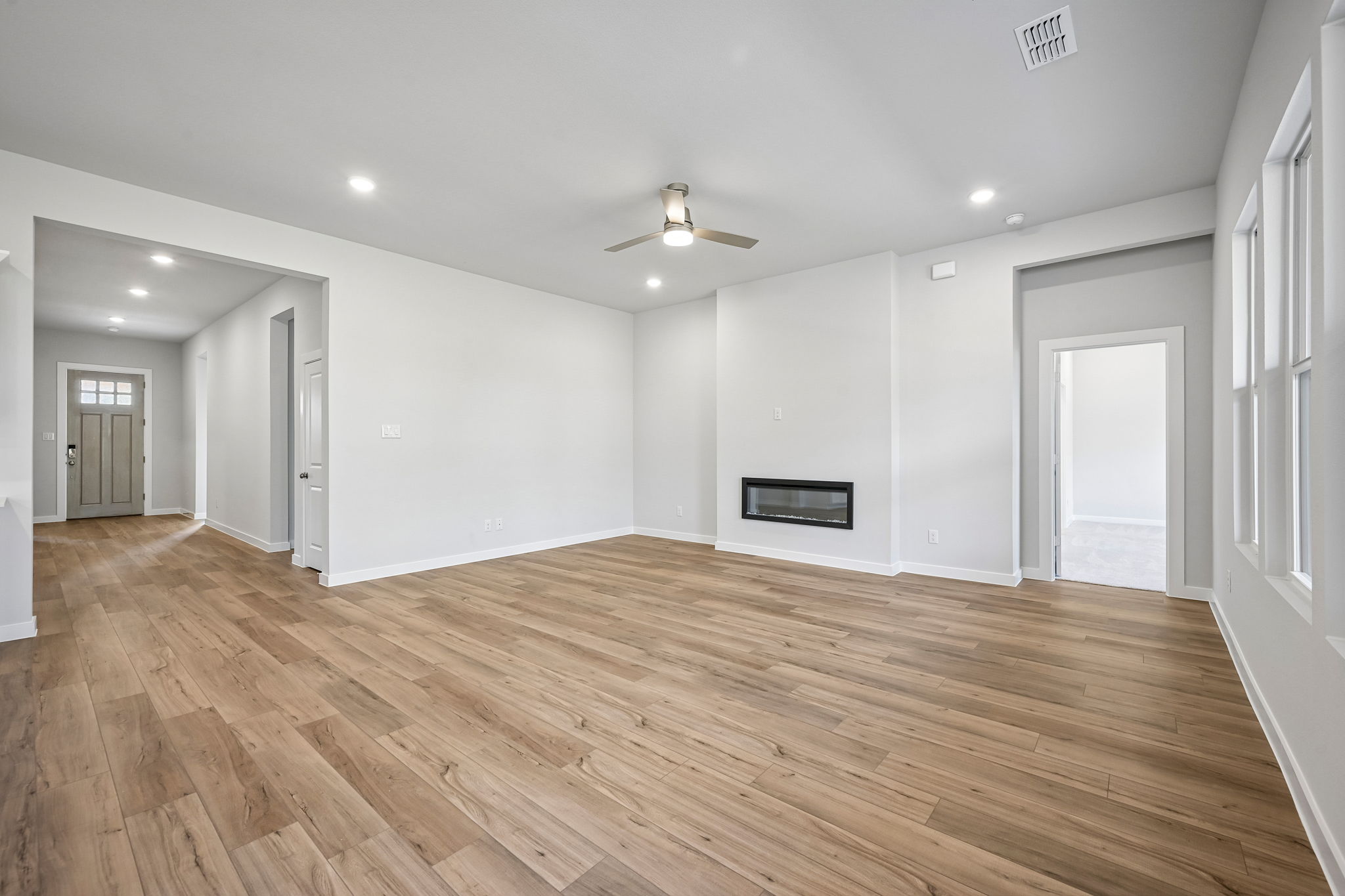 A room with wood floors and a wood floor.