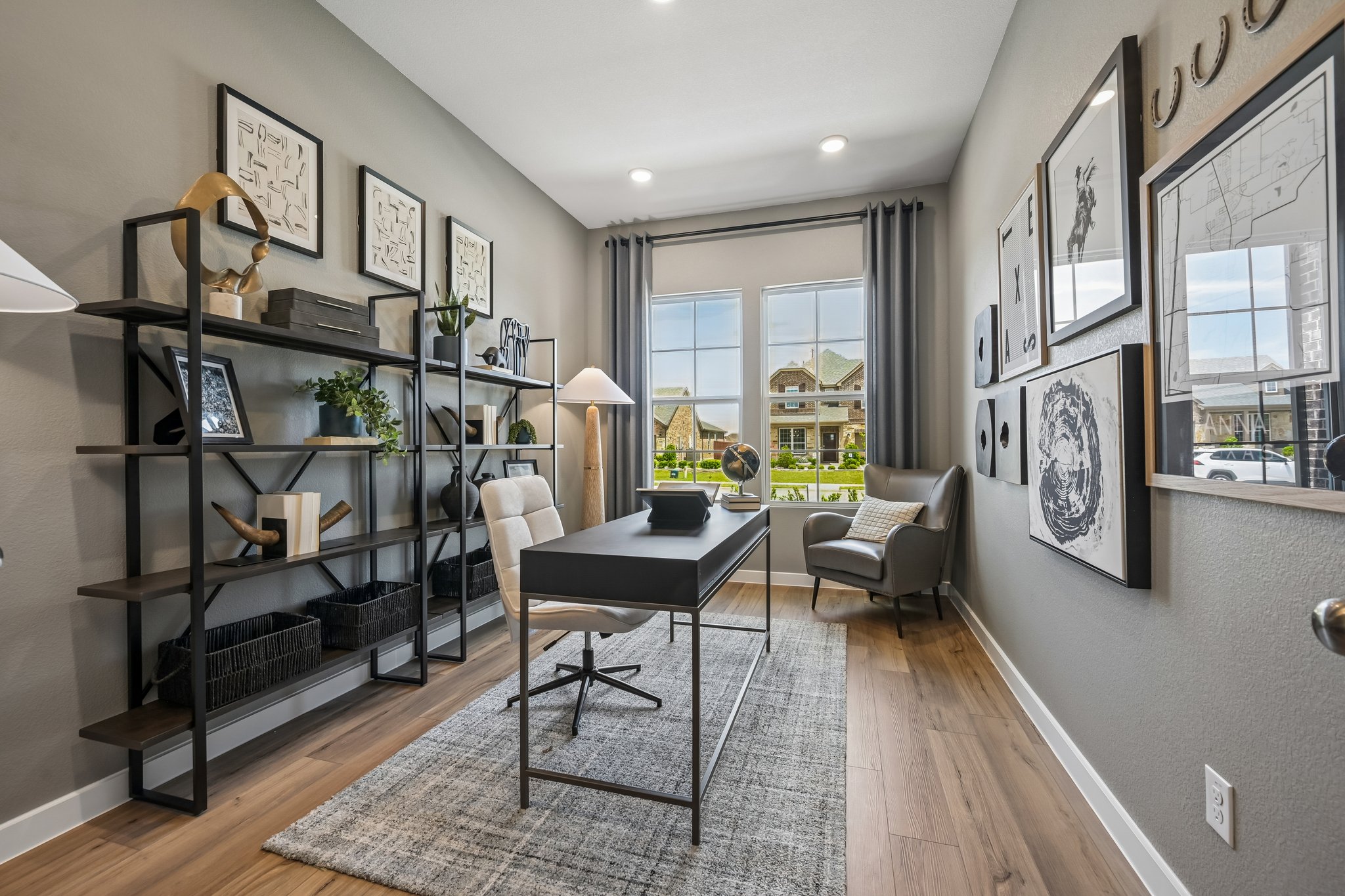 A room with a table and shelves.