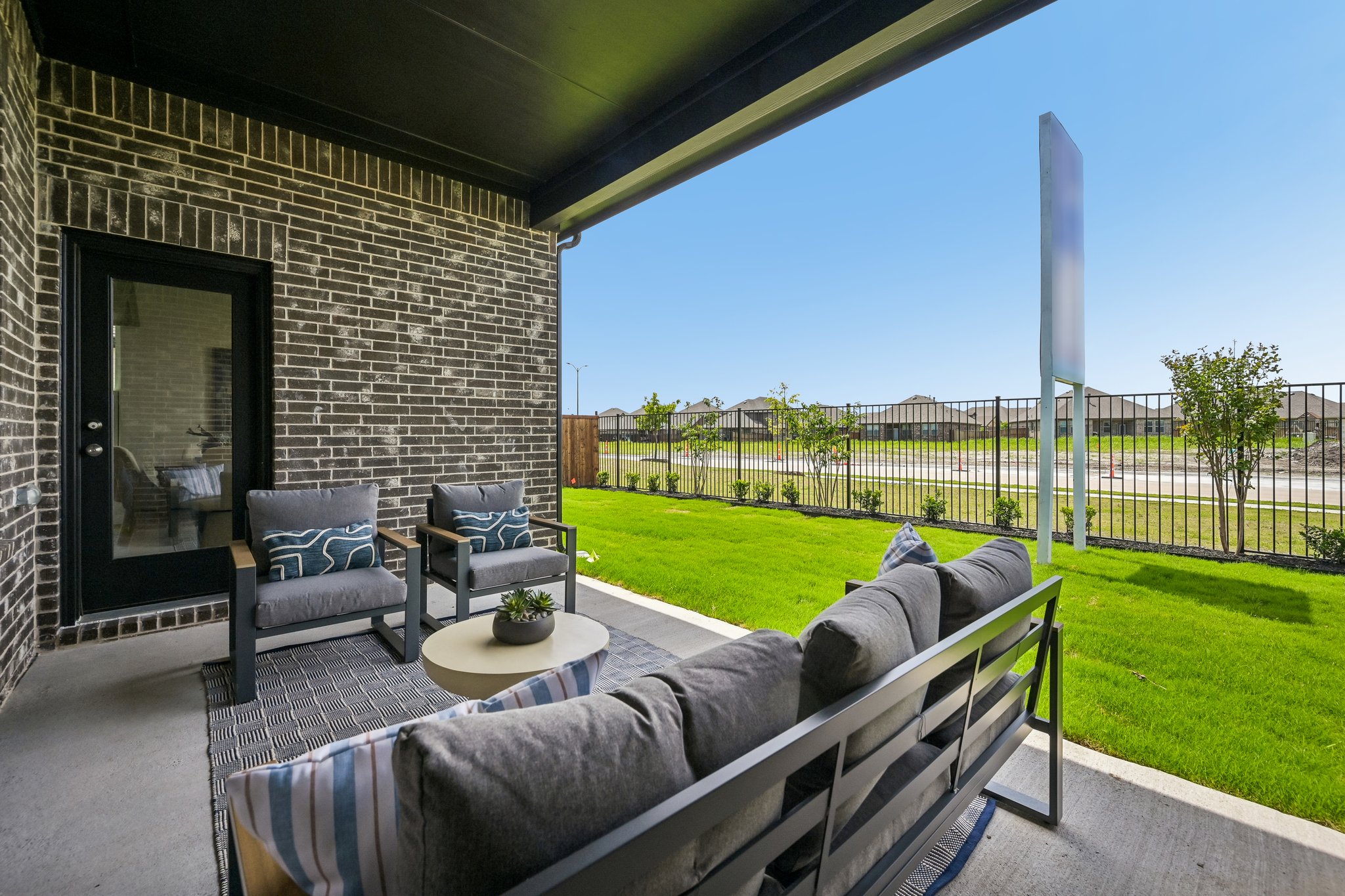 A couch and a table outside.