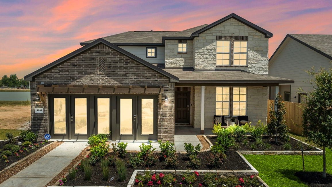 A house with a large front yard.