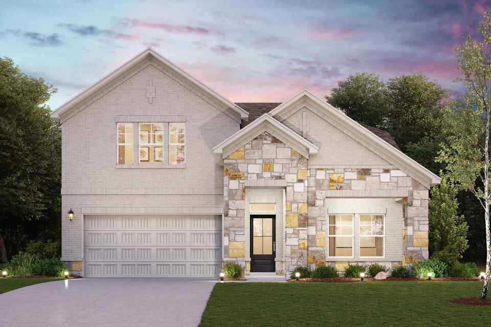 A house with a driveway and a lawn in front of it.