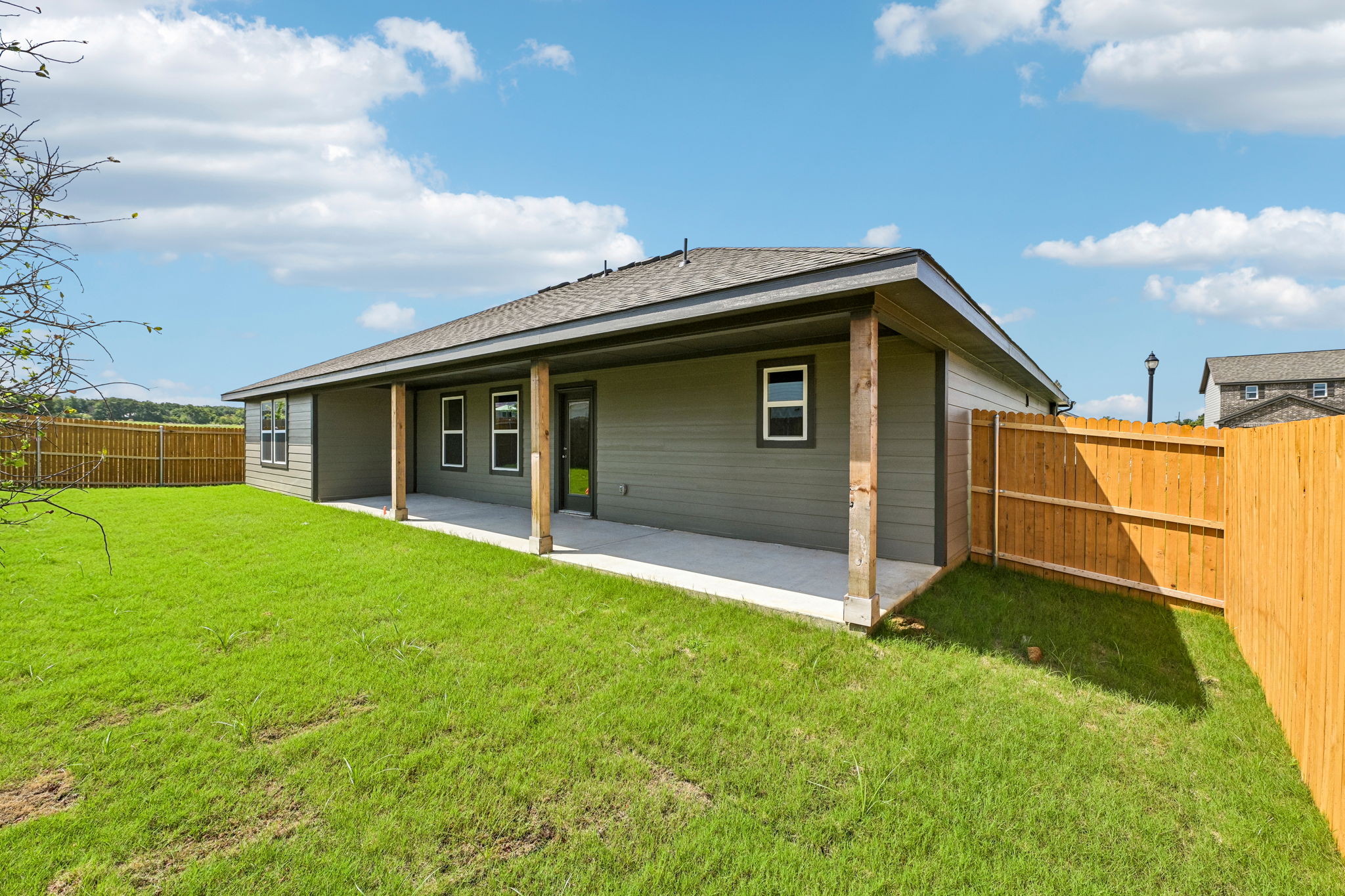 A house with a fence around it.