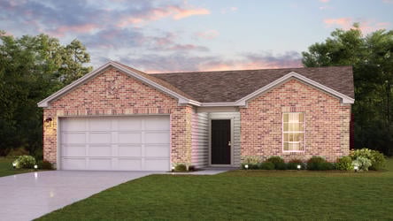 A brick house with a garage.