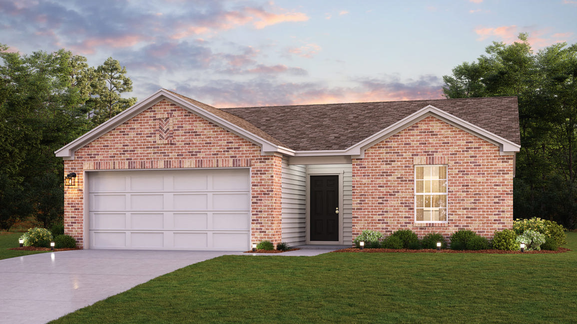 A brick house with a garage.