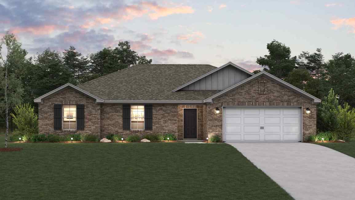 A house with a garage and a lawn in front of it.