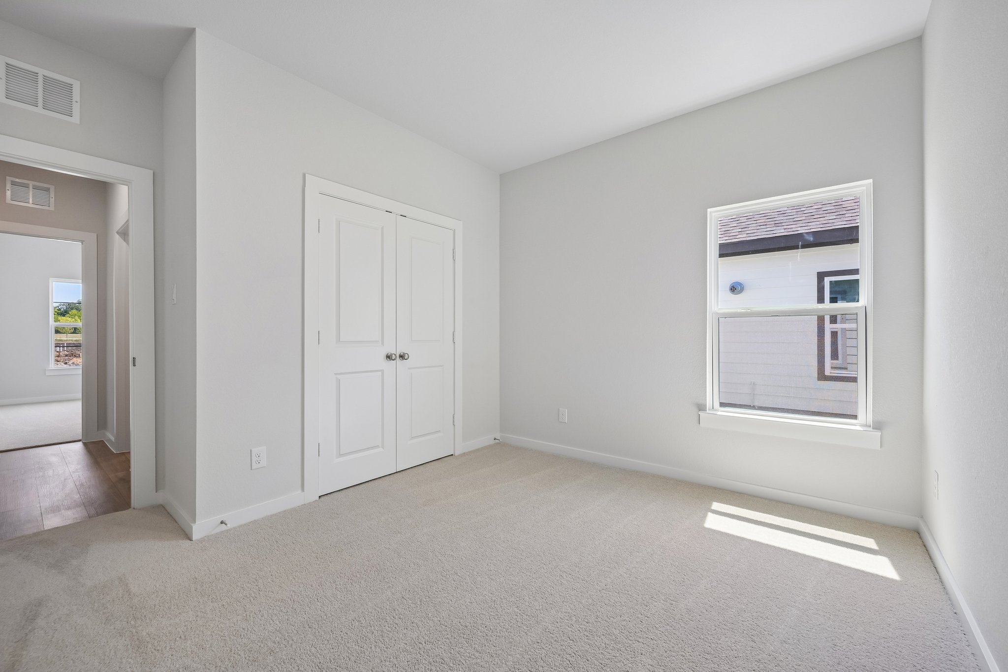 A room with white doors.