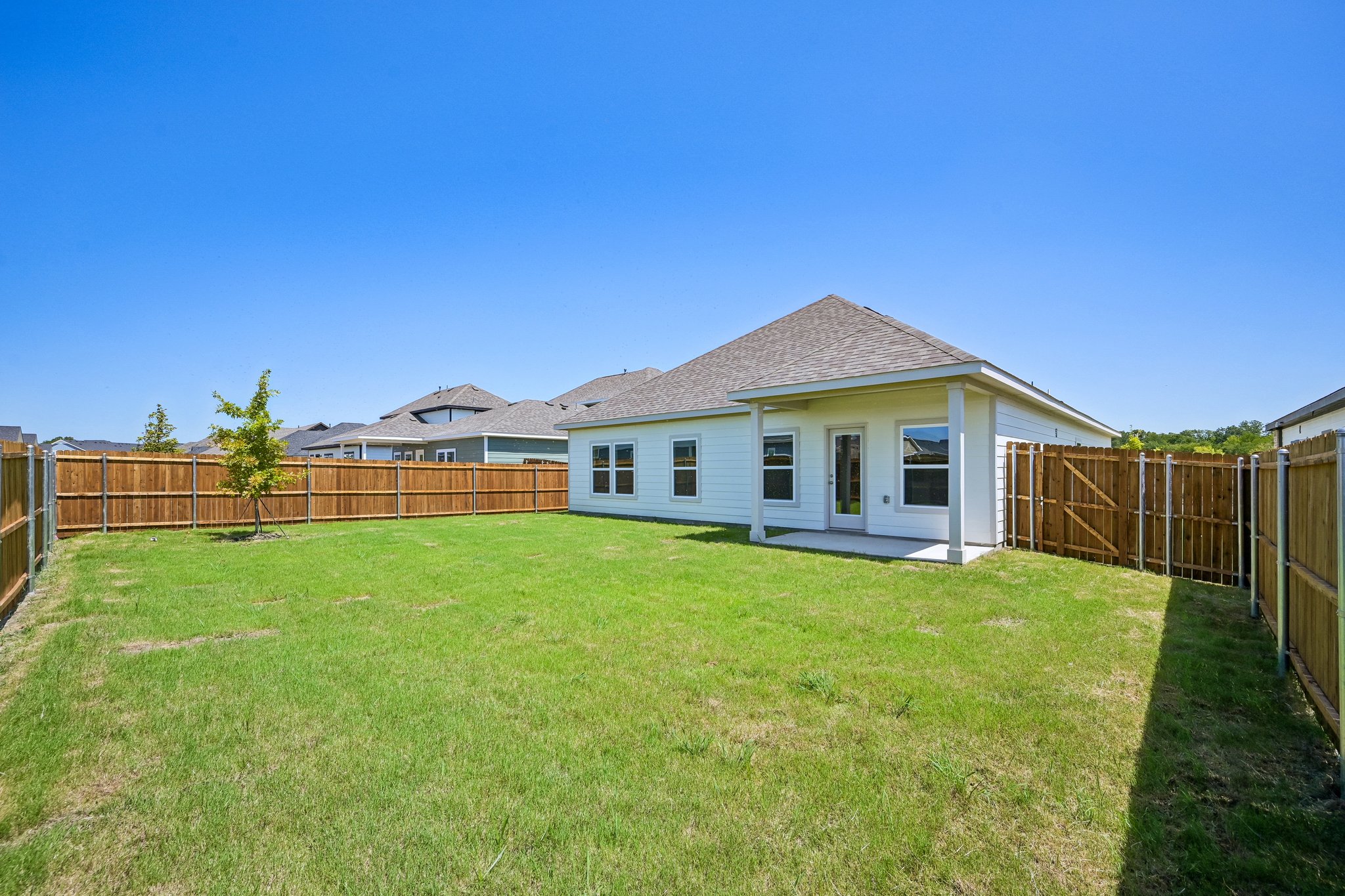 A house with a fence around it.