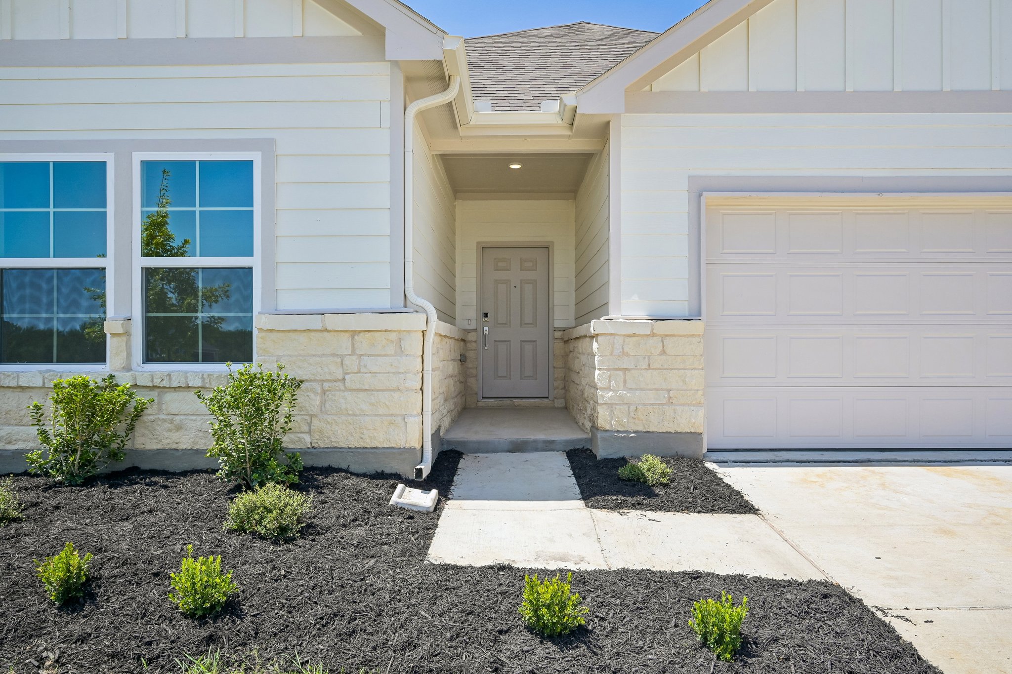 A house with a garage and a garage.