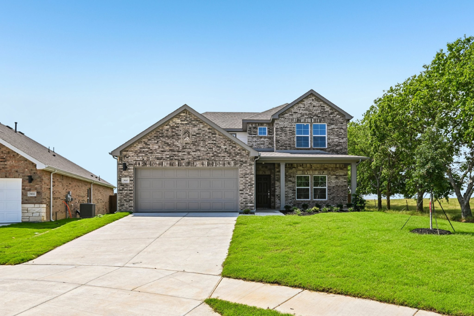 A house with a driveway.