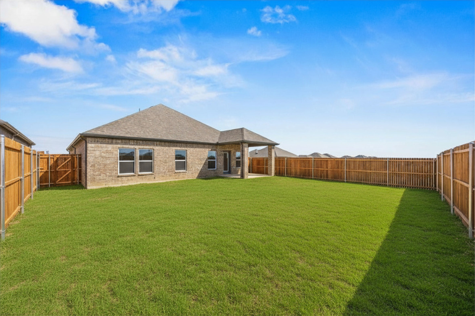 A house with a fence around it.