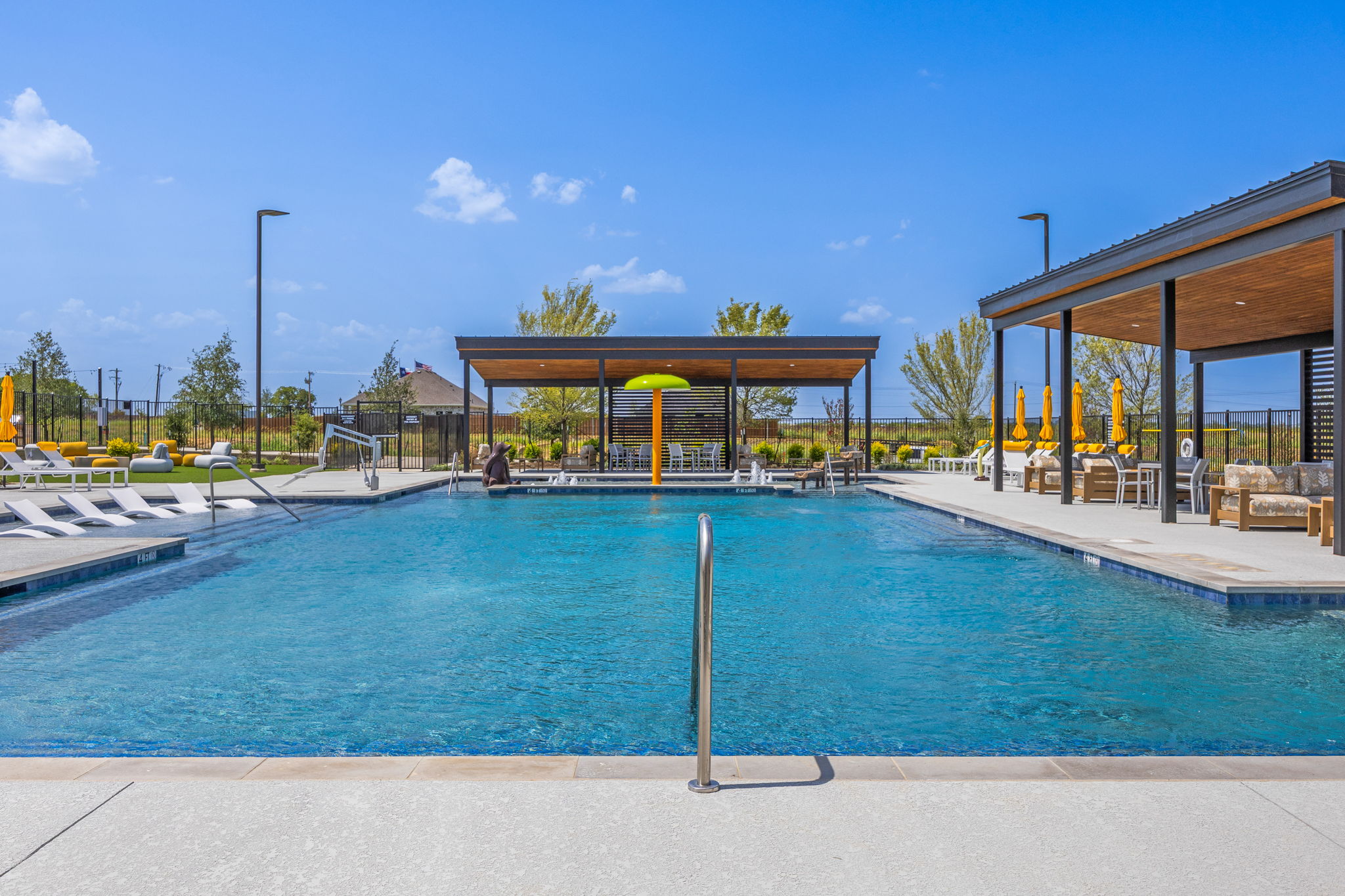 A swimming pool with a covered area.
