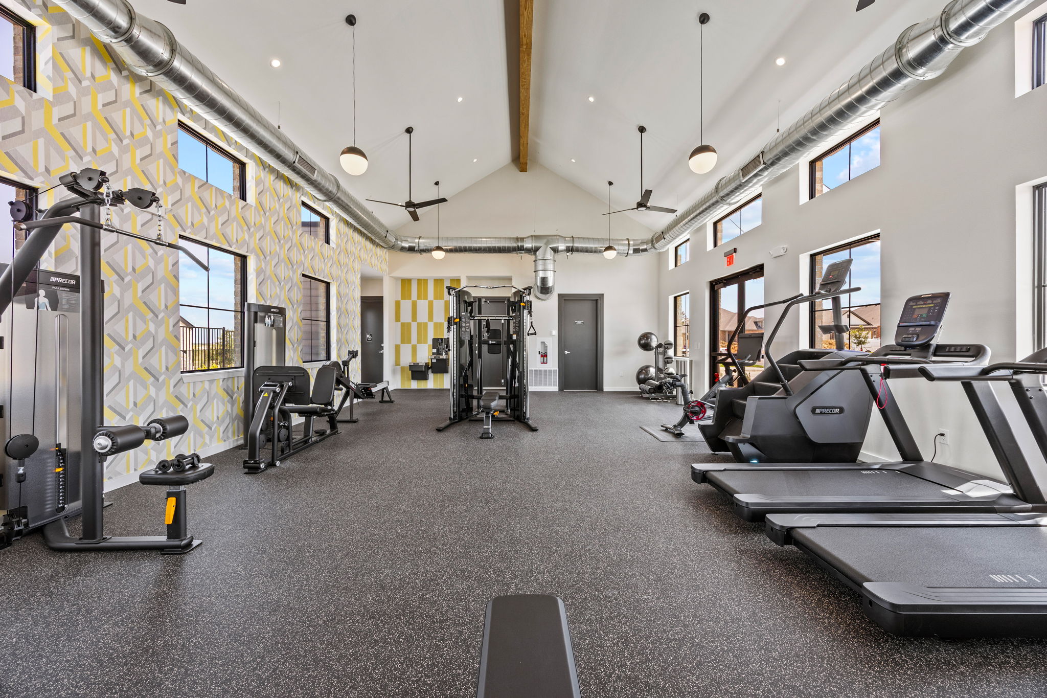 A gym with treadmills.