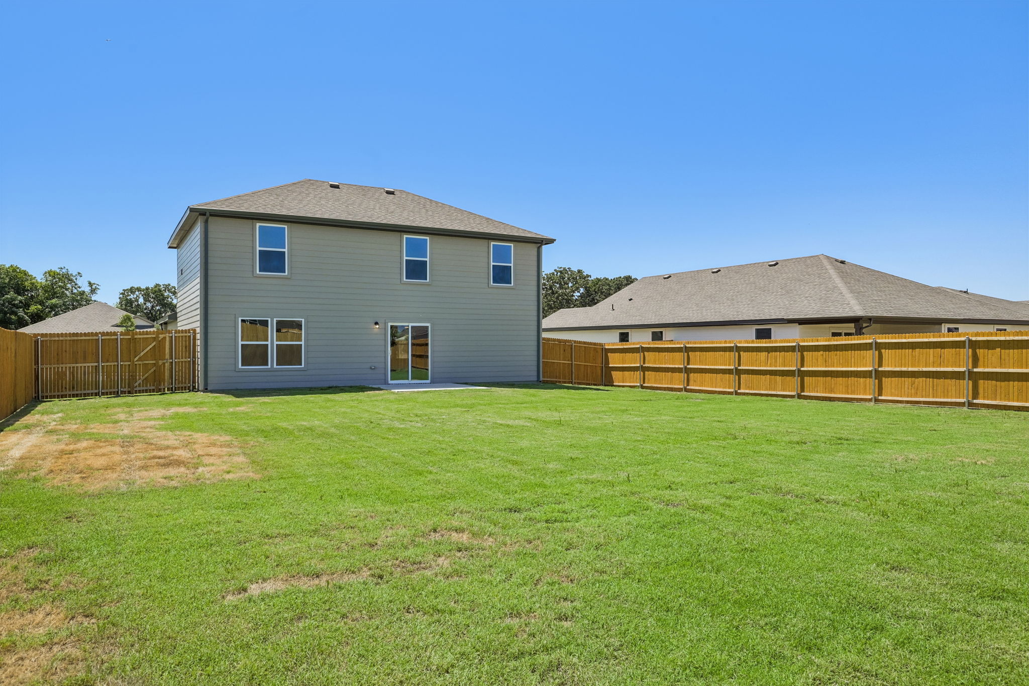 A house with a fence around it.