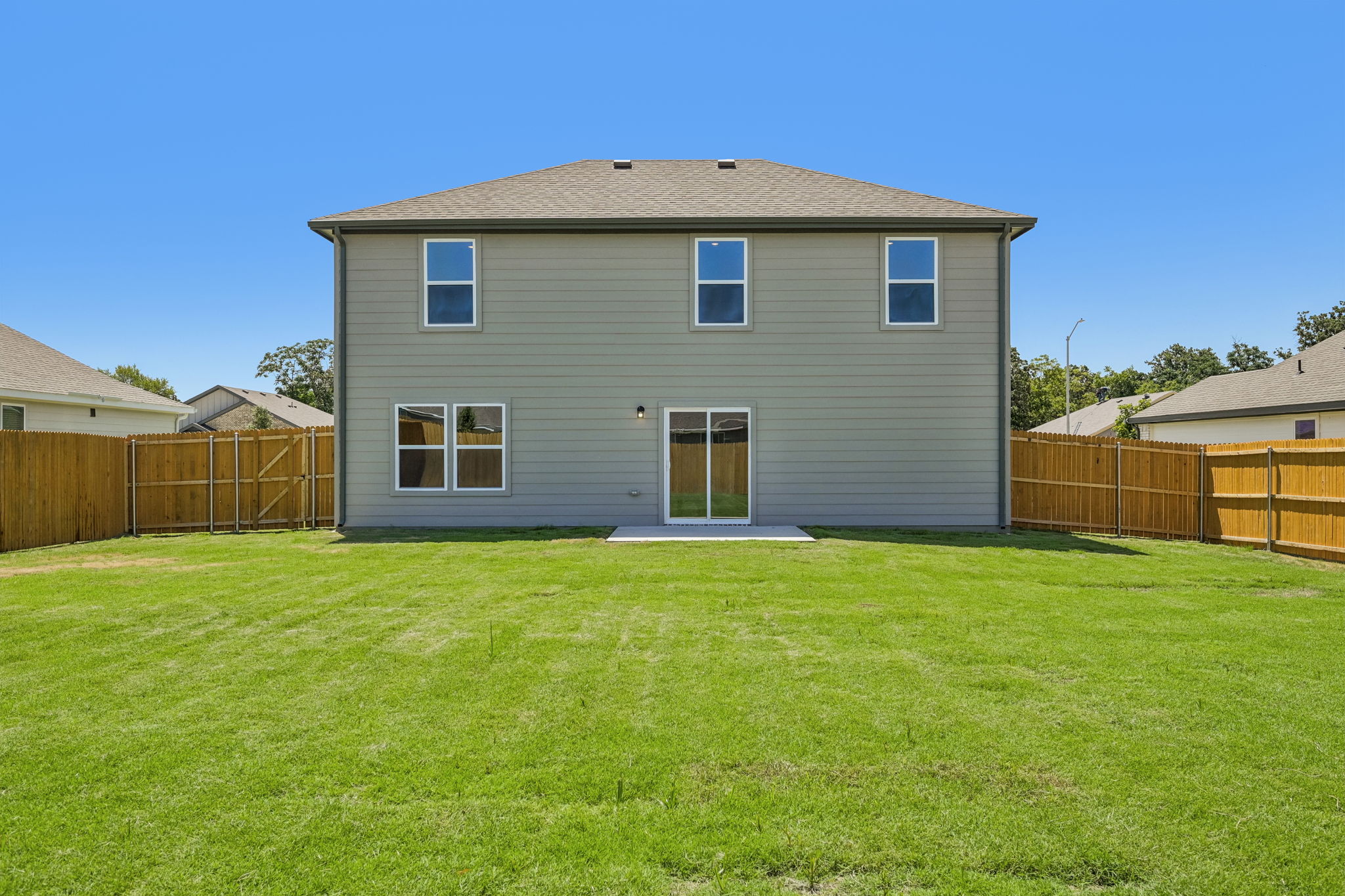 A house with a fence around it.