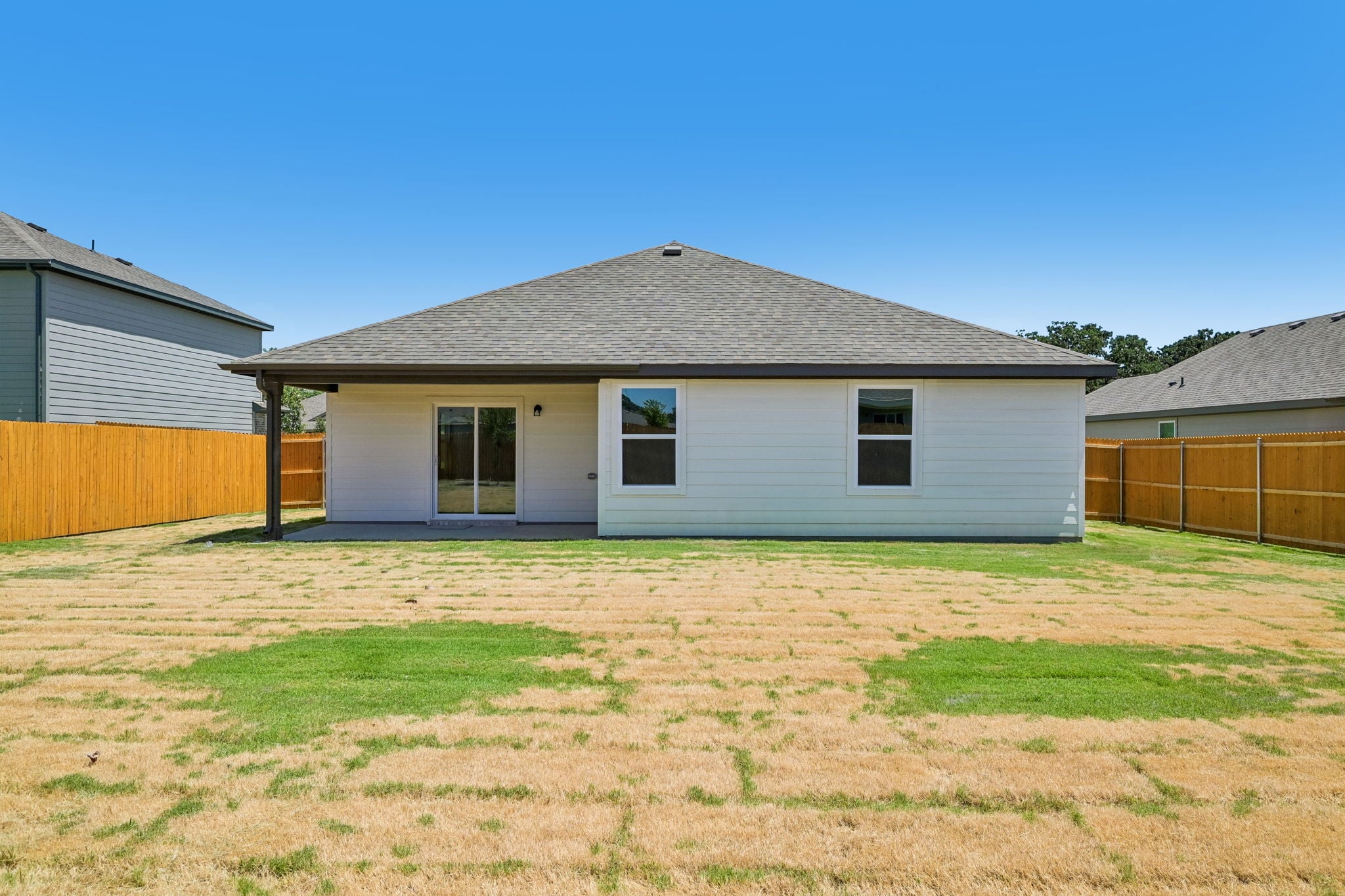 A house with a fence around it.