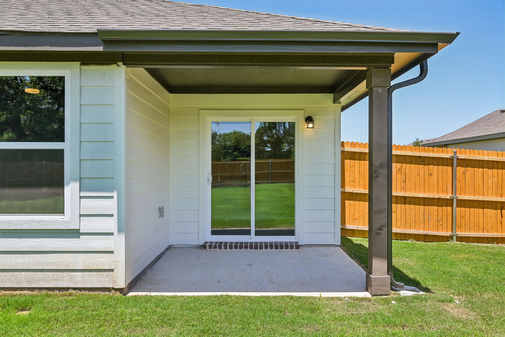 A house with a wood fence.
