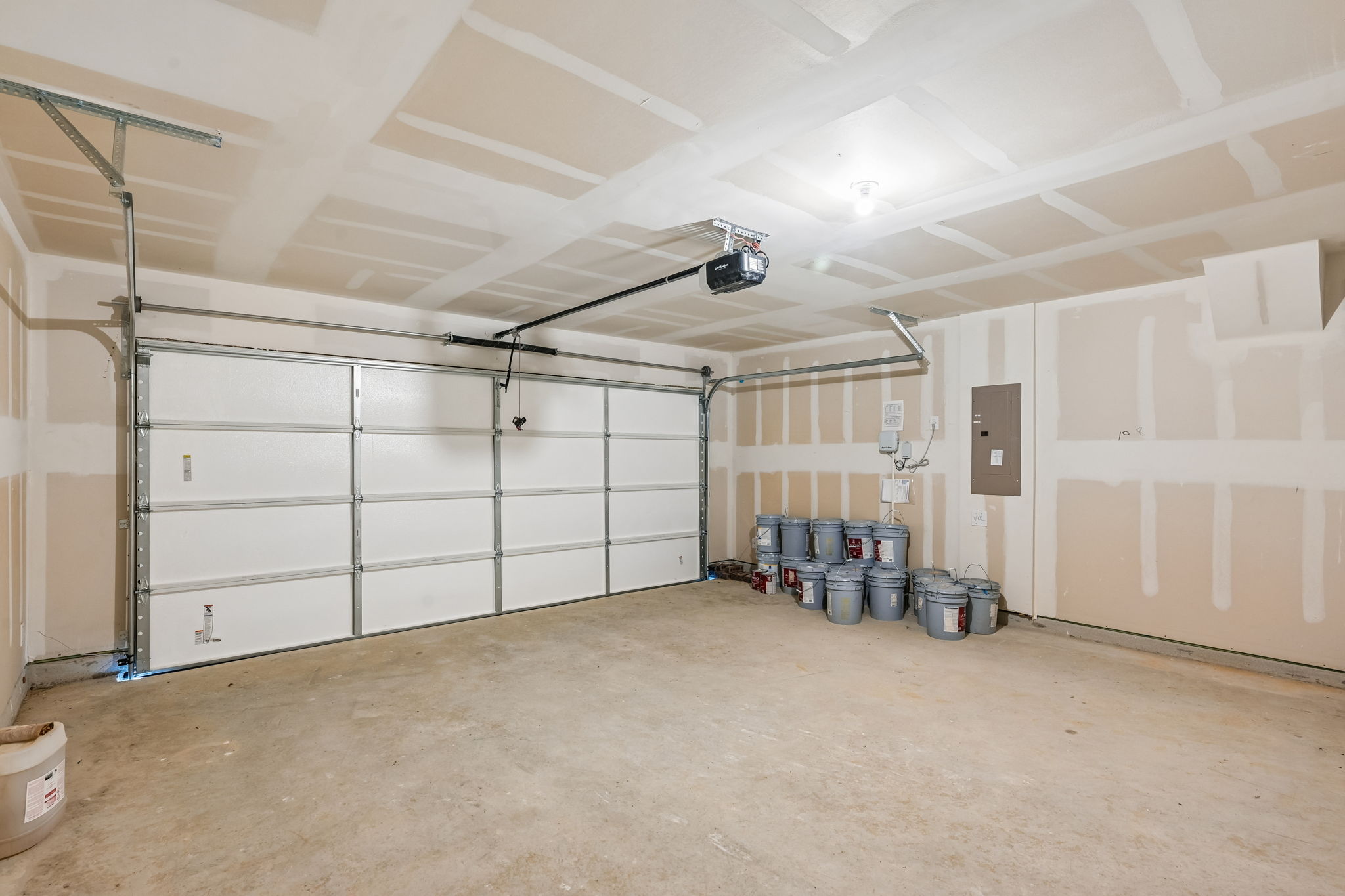 A room with a large metal wall.