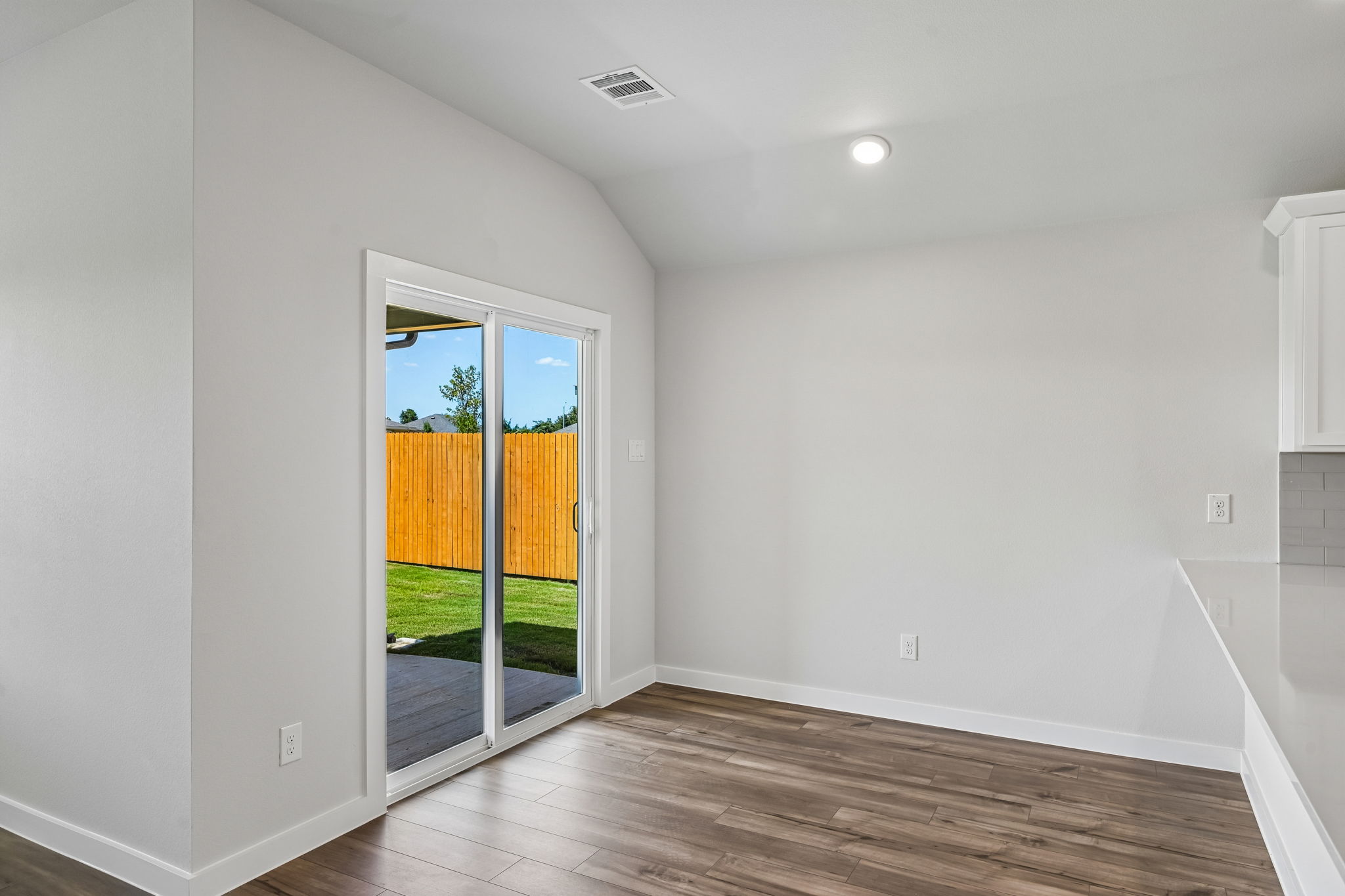 A room with a glass door.