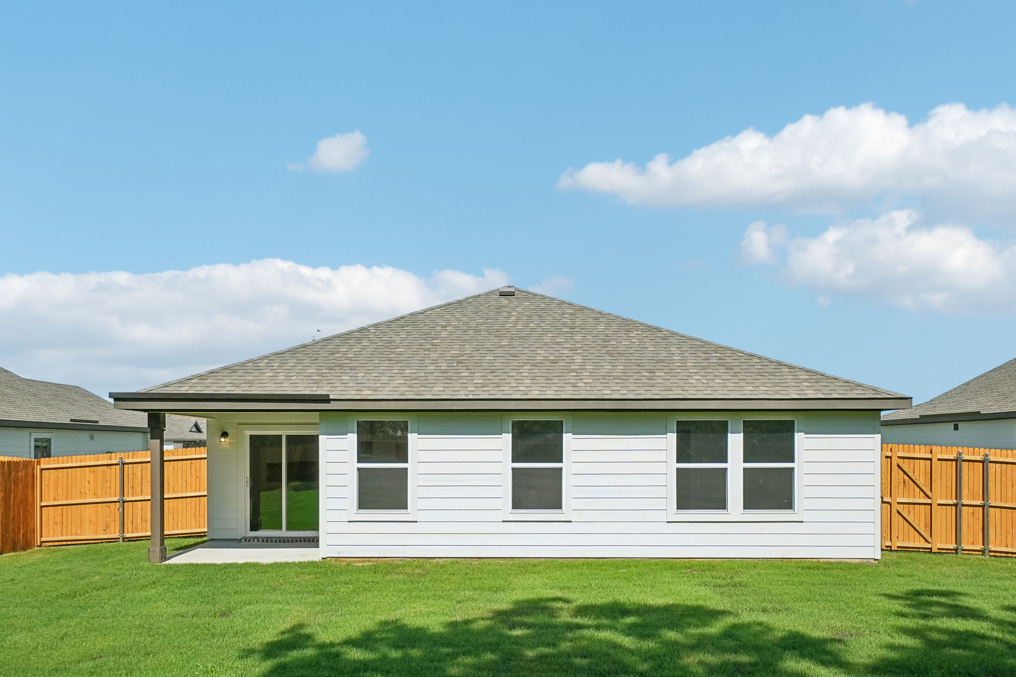 A house with a fence around it.