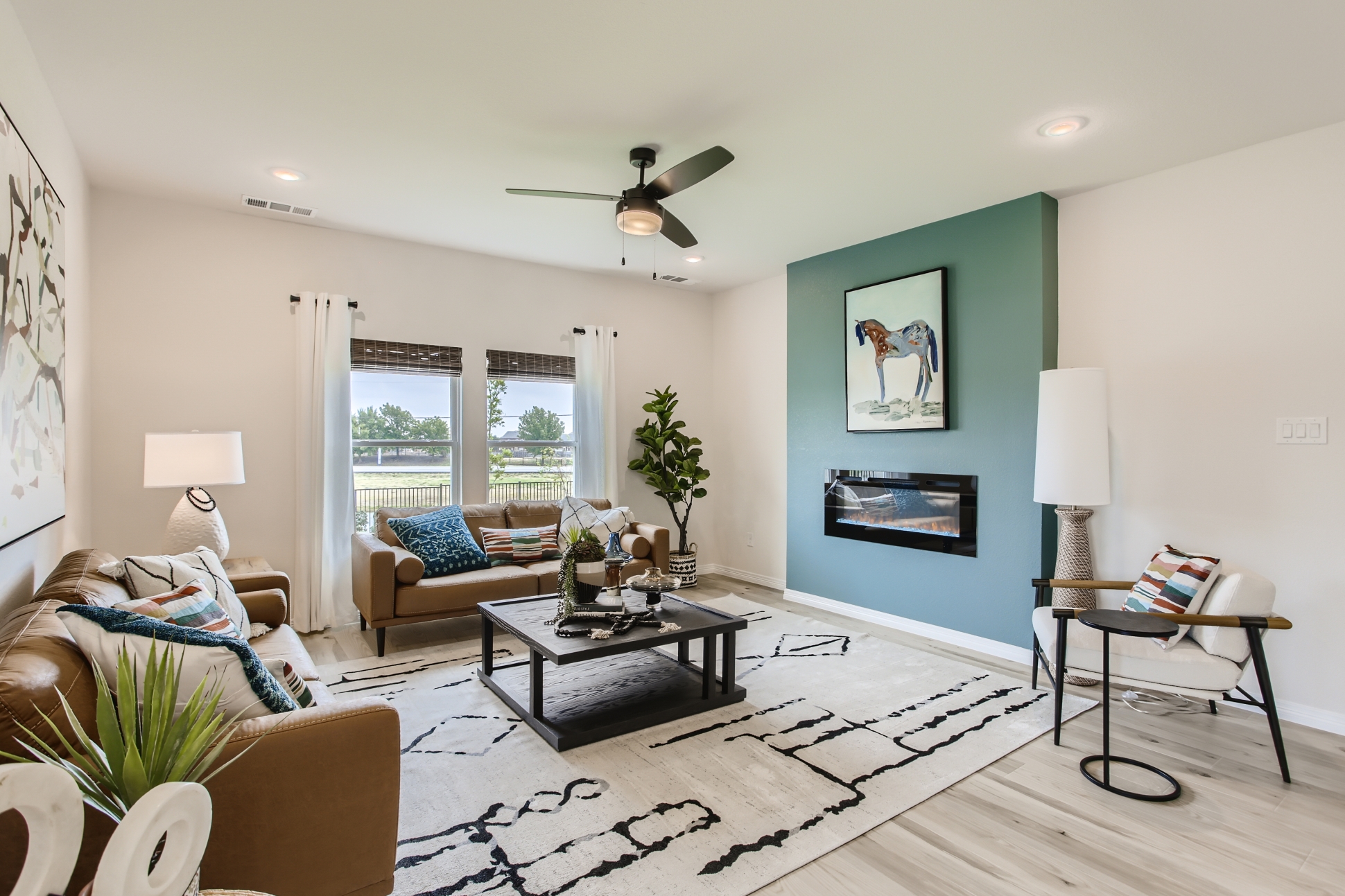 A living room with a fan.