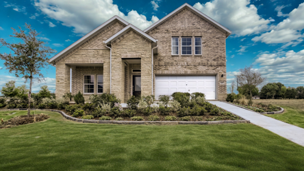A house with a large front yard.
