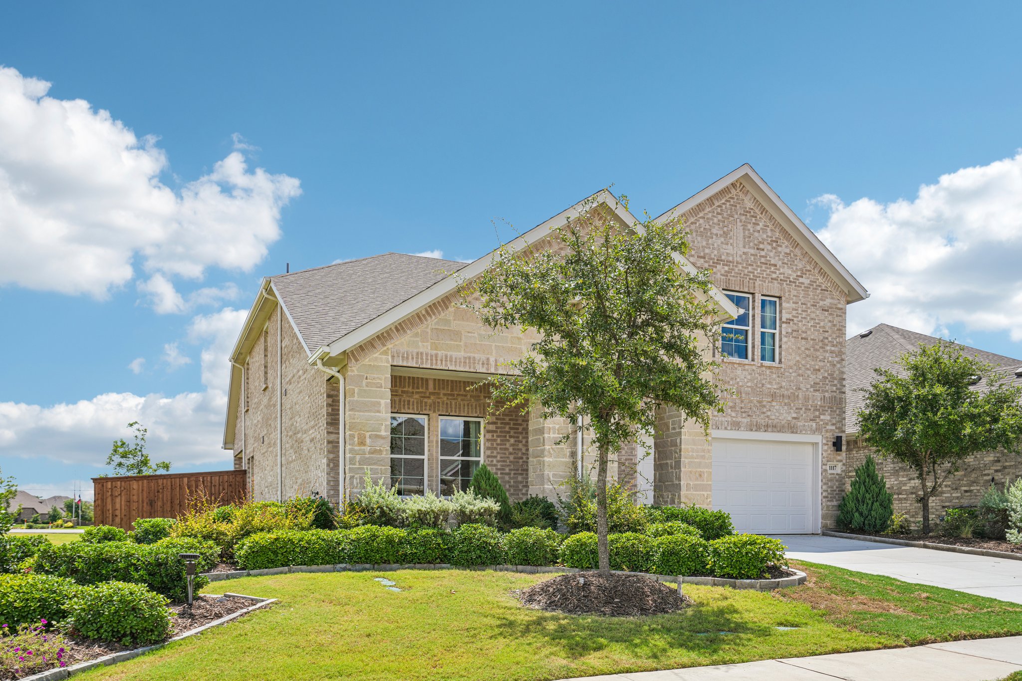 A house with a large front yard.