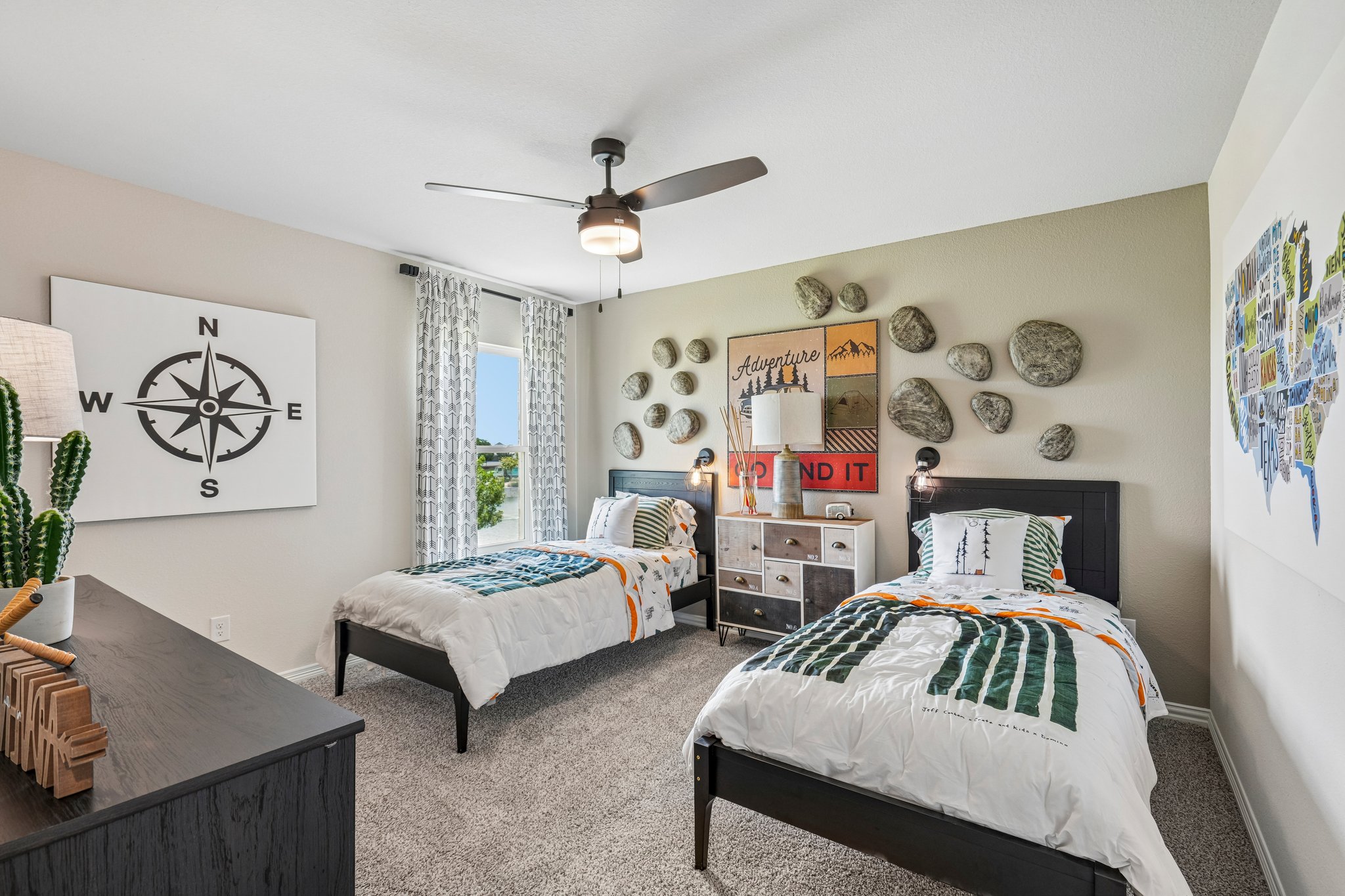 A bedroom with two beds.