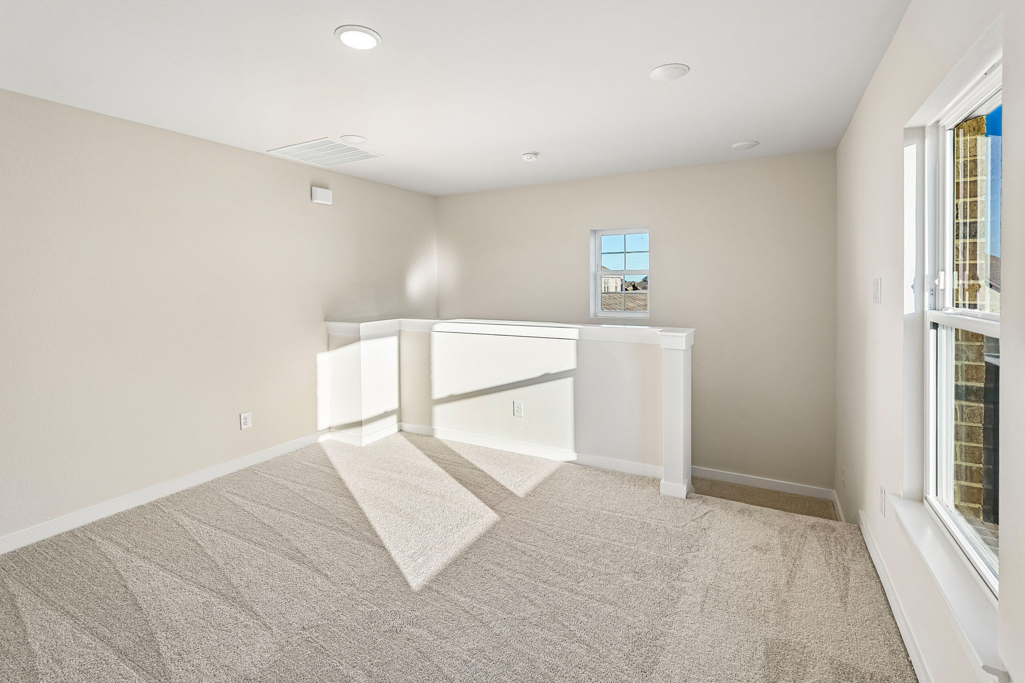 A room with a counter and a window.