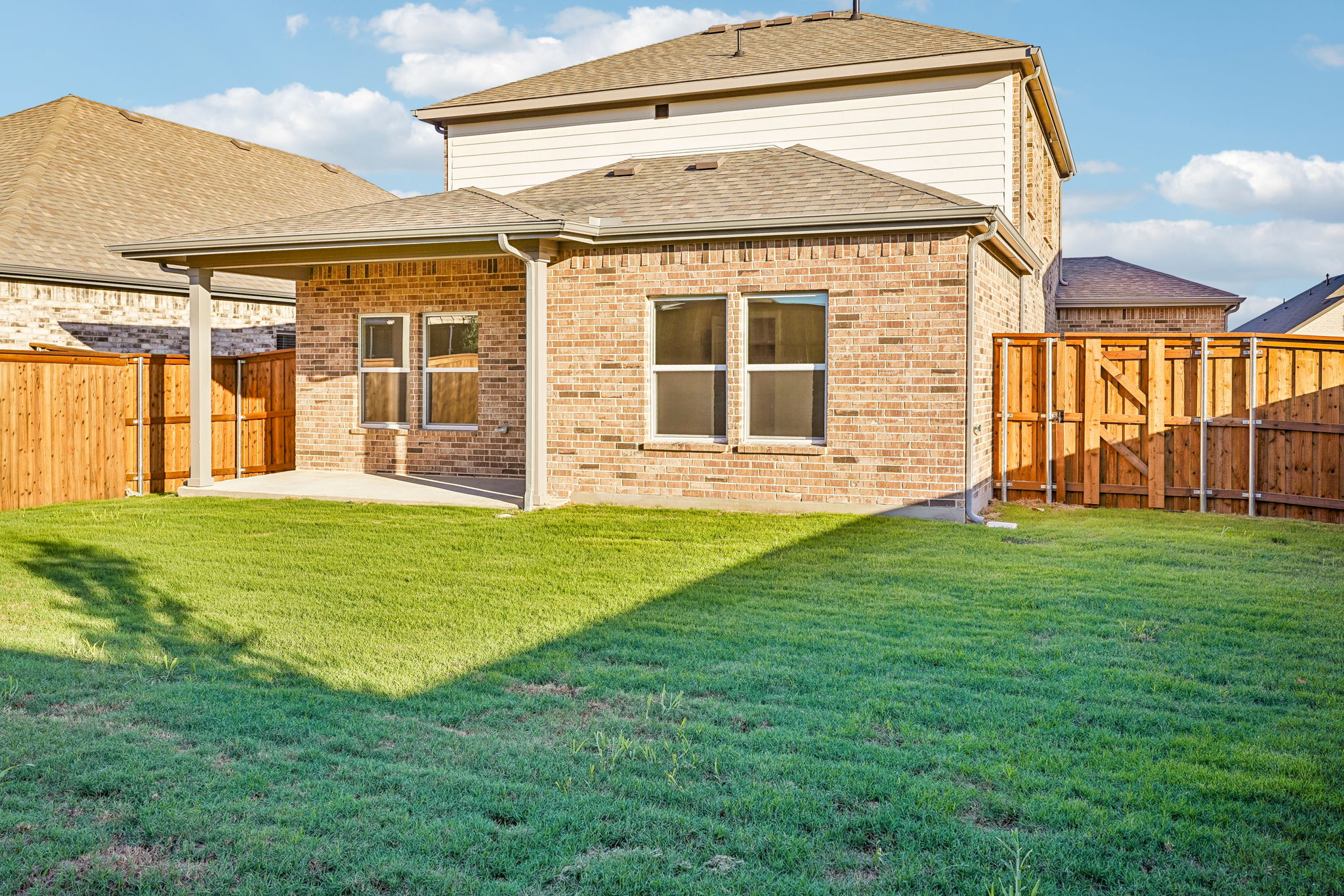 A house with a lawn.