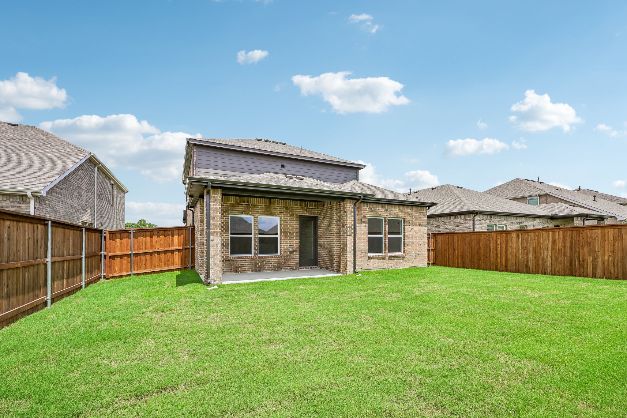 A house with a fence around it.