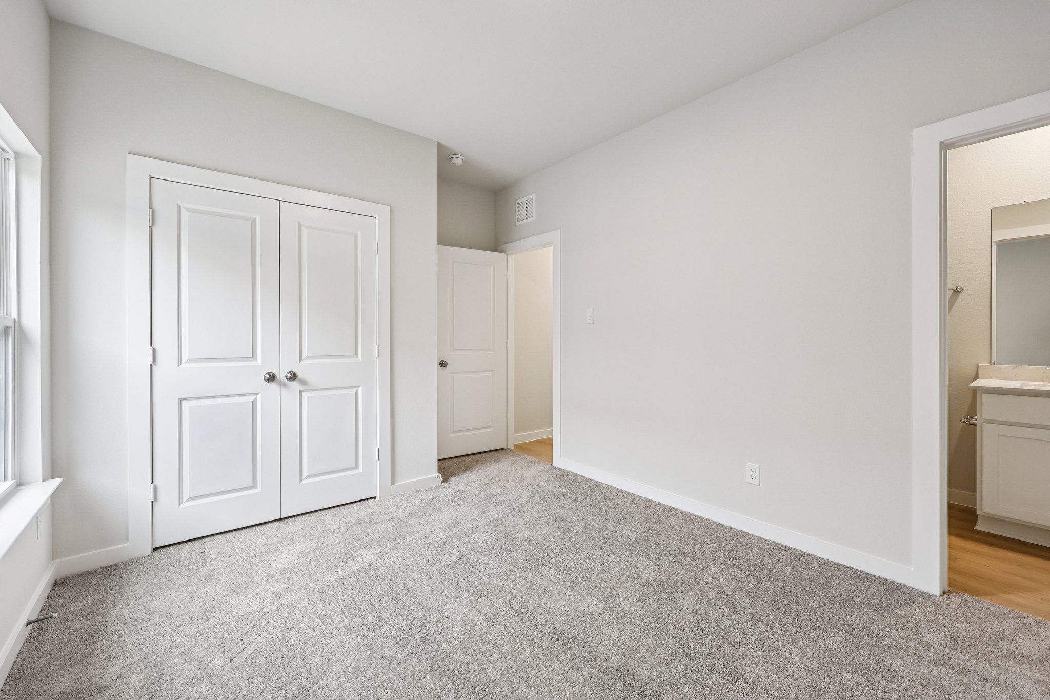 A room with white doors.